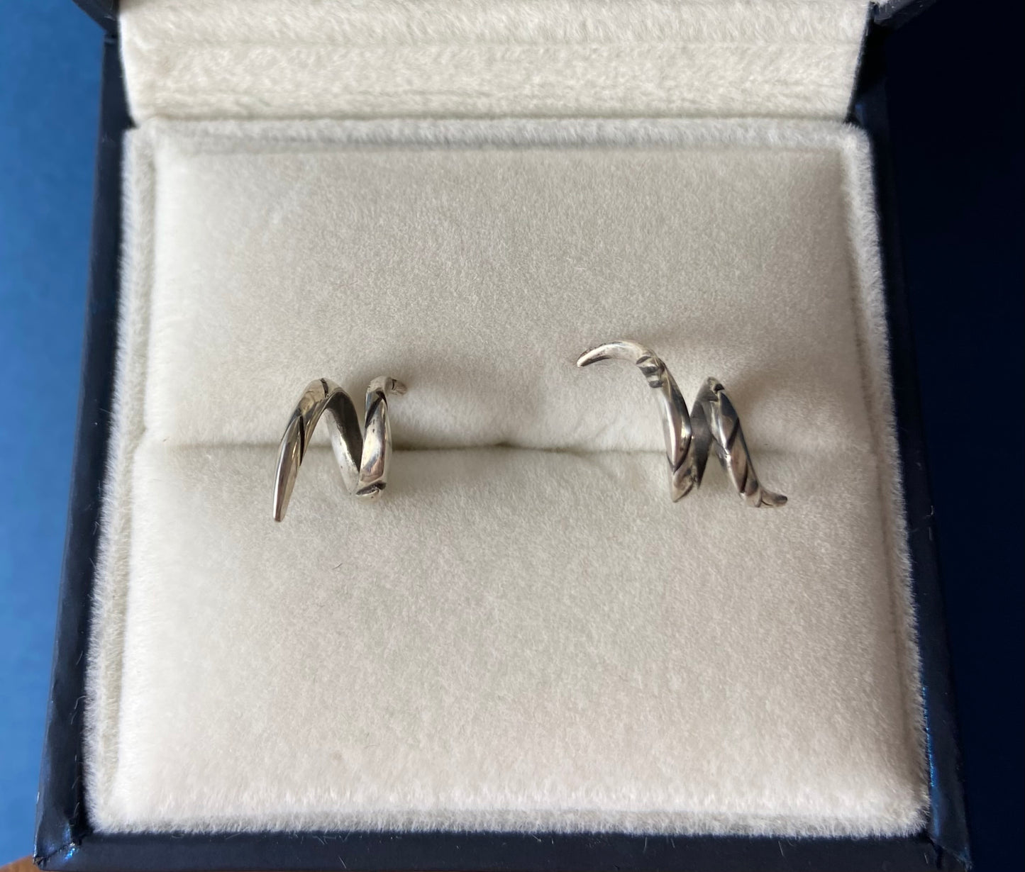 Handmade Asymmetrical Oxidized and Mirror Polish Sterling Silver Spiral Horn Stud Earrings — Artisan Jewelry