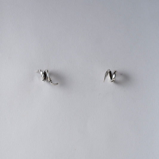 Handmade Asymmetrical Oxidized and Mirror Polish Sterling Silver Spiral Horn Stud Earrings — Artisan Jewelry