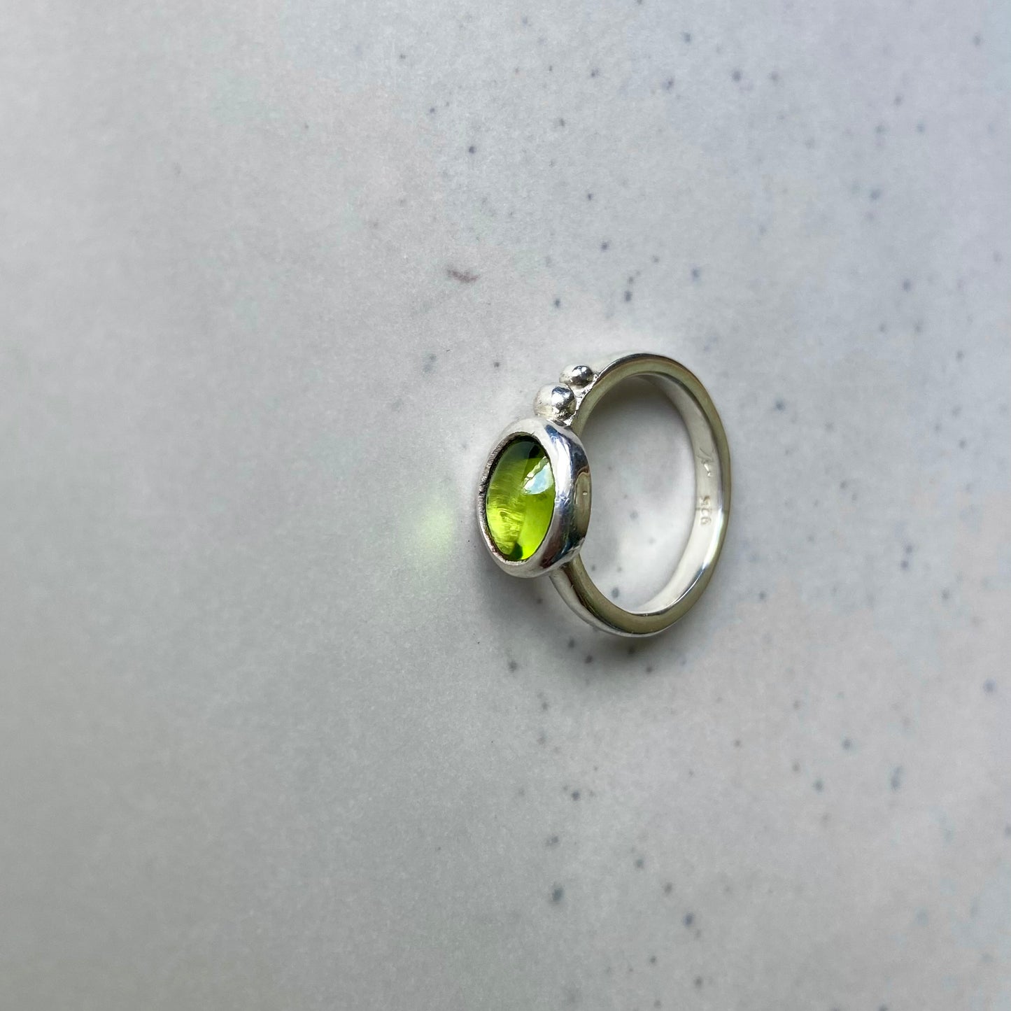 Exquisite Tanzanian peridot handcrafted in a timeless silver ring