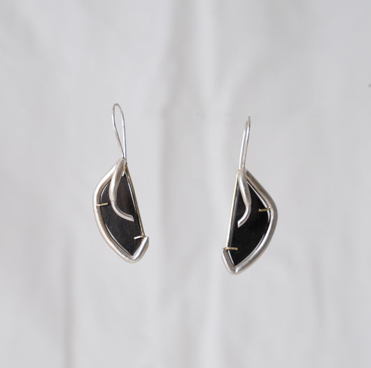 Pronghorn earrings in silver, hand fabricated in sterling silver with ebony wood hand set in 14k yellow gold dangle earrings