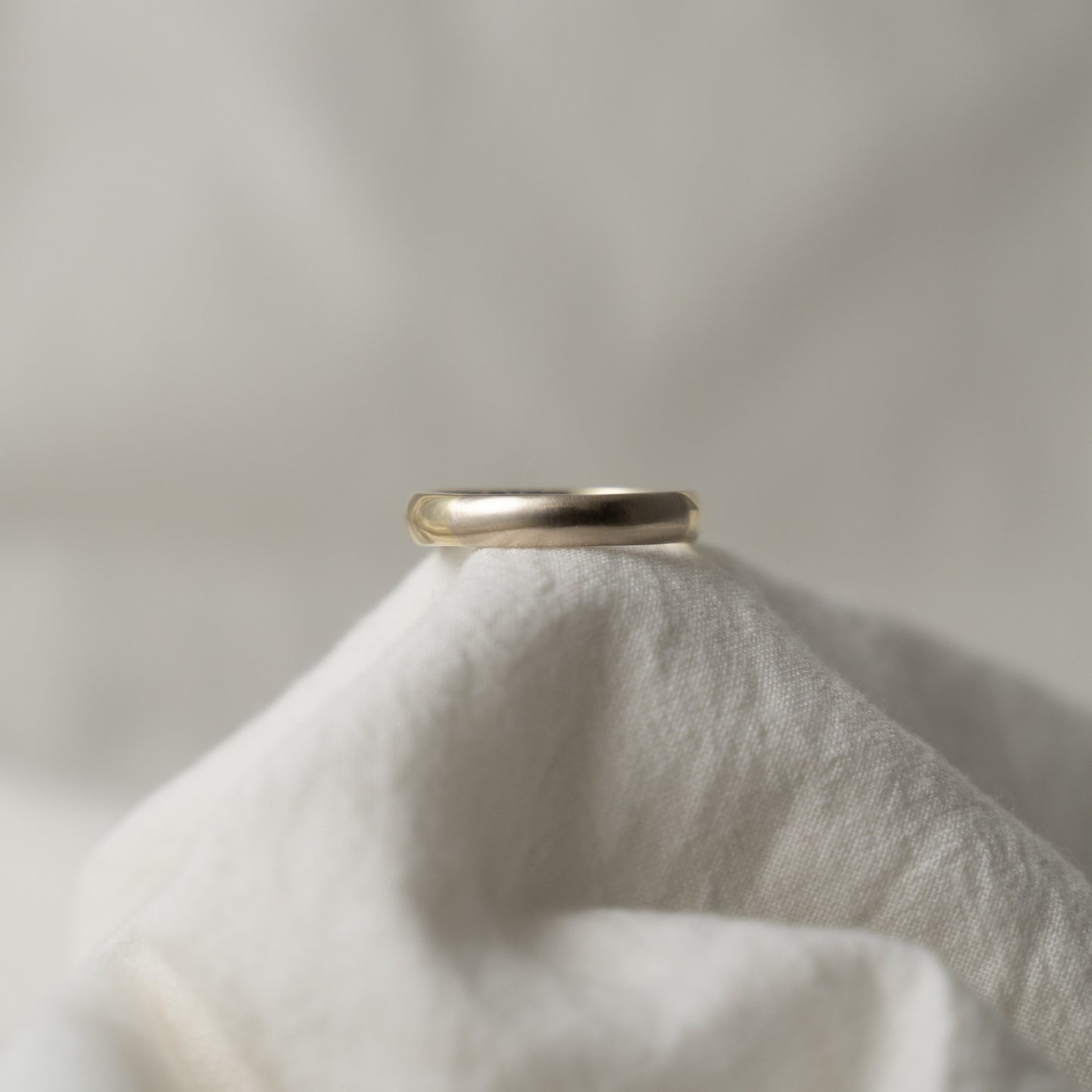 Minimalist, dual-metal, 18k white and yellow wedding ring band