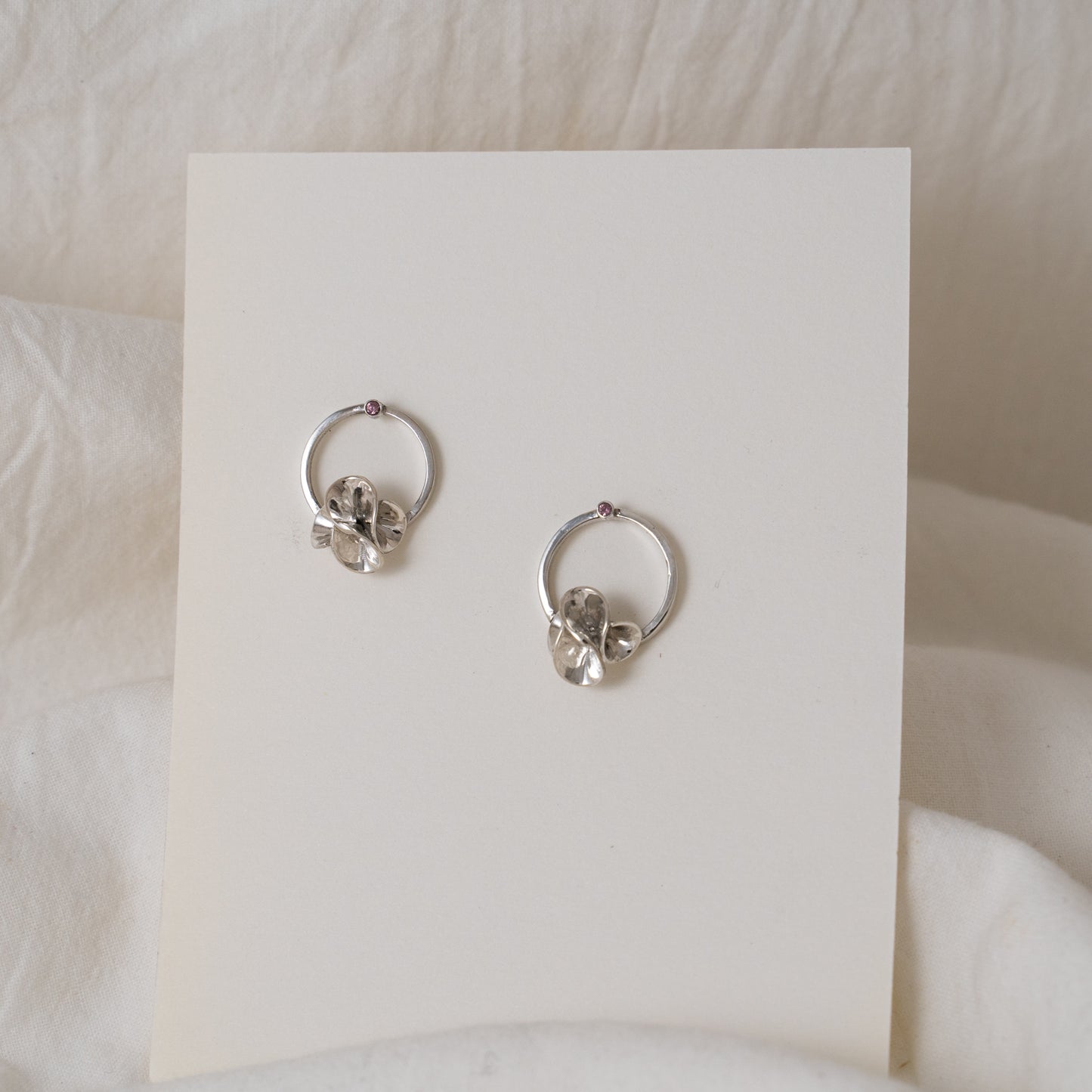 Floral stud earrings with sapphires