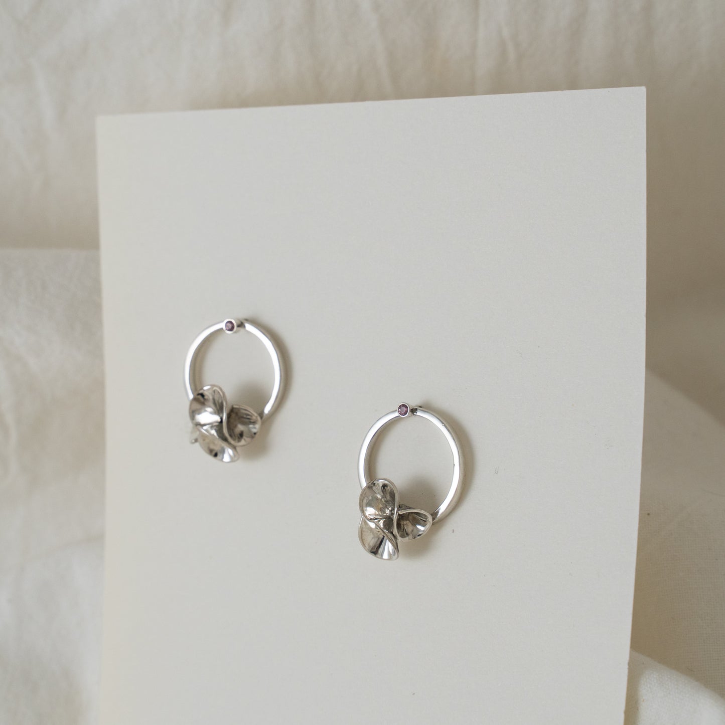 Floral stud earrings with sapphires