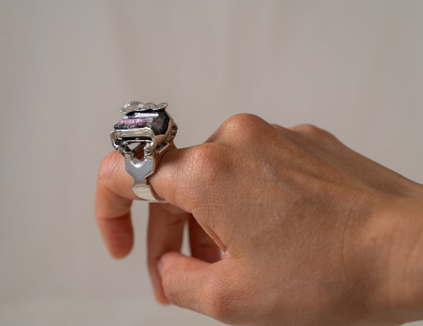 The Savannah Ring, oxidized sterling silver hand sculpted and cast from wax with a hand set raw watermelon tourmaline crystal in this iconic statement ring