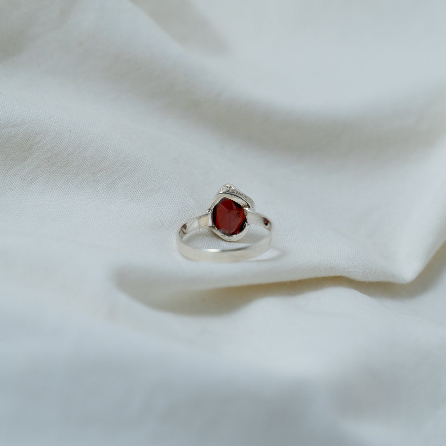 Textured, silver, garnet cabochon ring