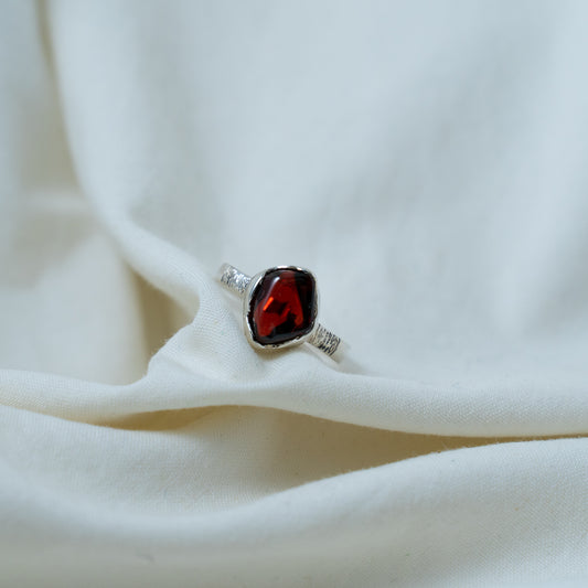 Textured, silver, garnet cabochon ring