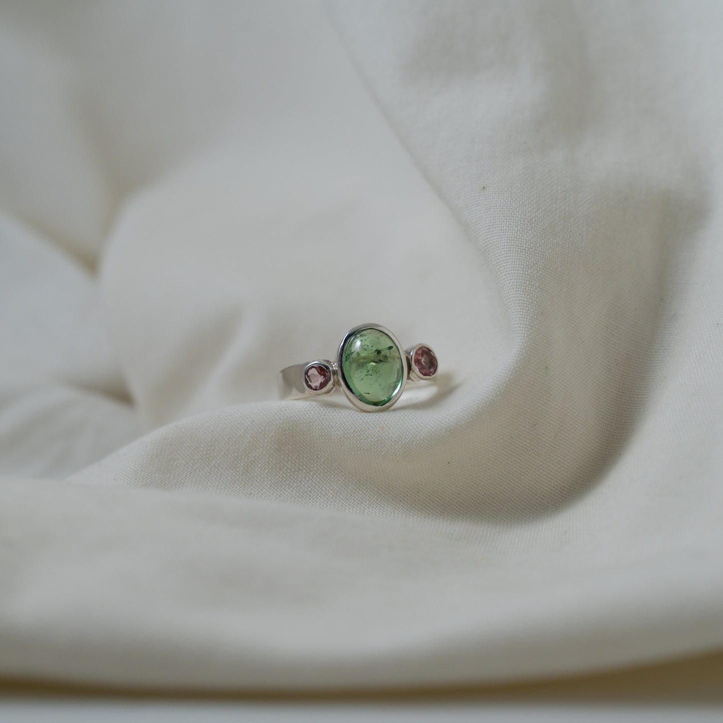 Green tourmaline and pink sapphire silver ring