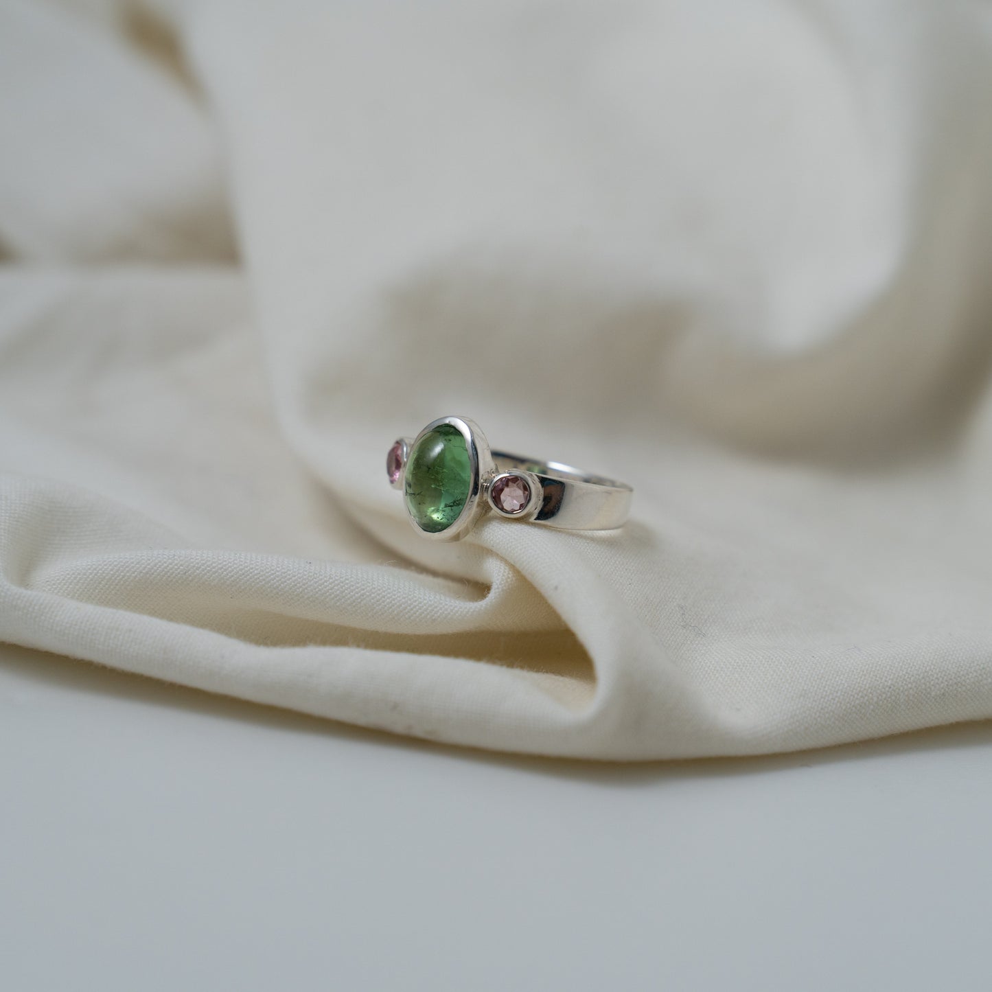 Green tourmaline and pink sapphire silver ring