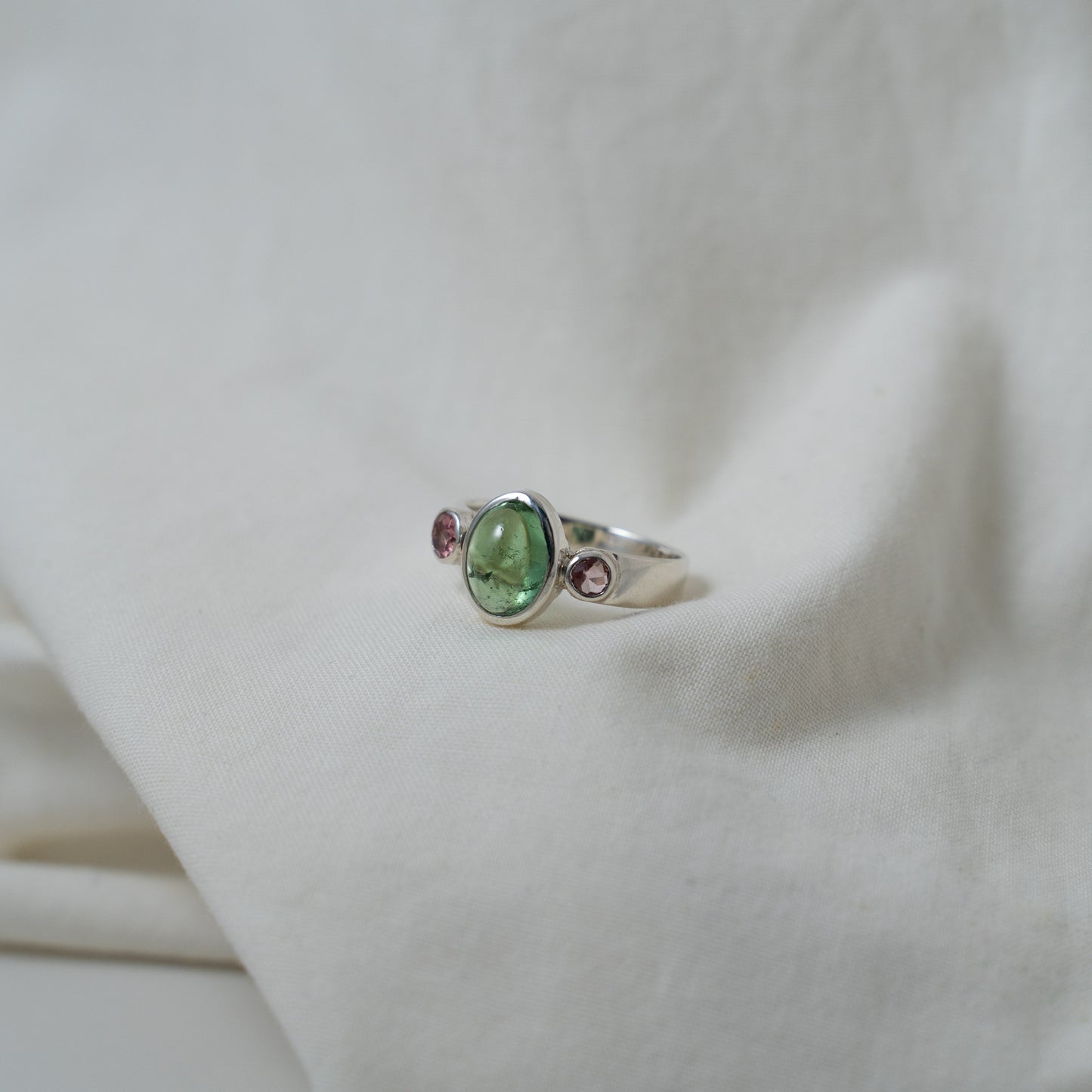 Green tourmaline and pink sapphire silver ring