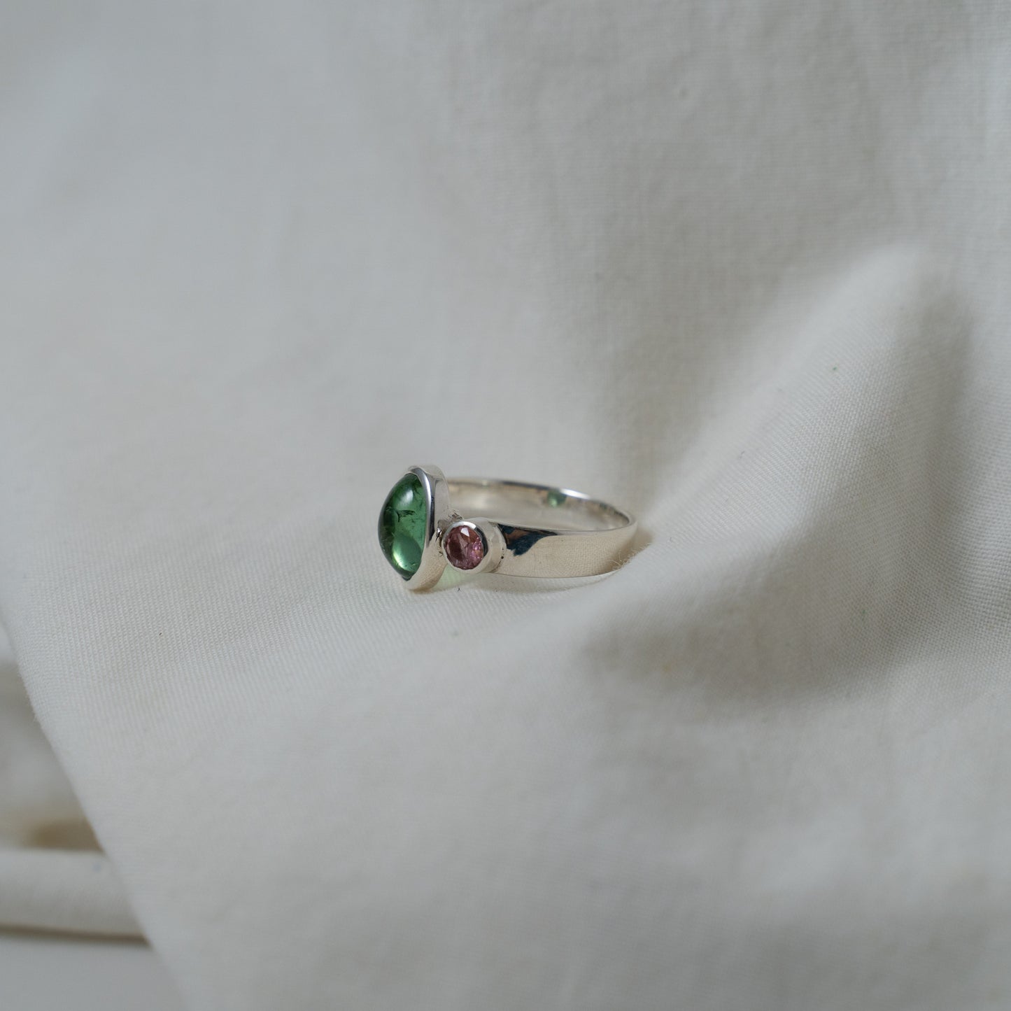 Green tourmaline and pink sapphire silver ring
