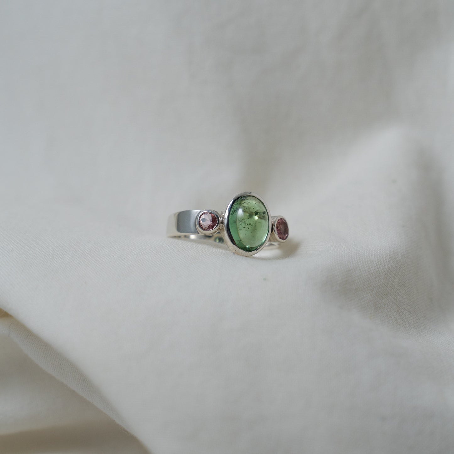 Green tourmaline and pink sapphire silver ring