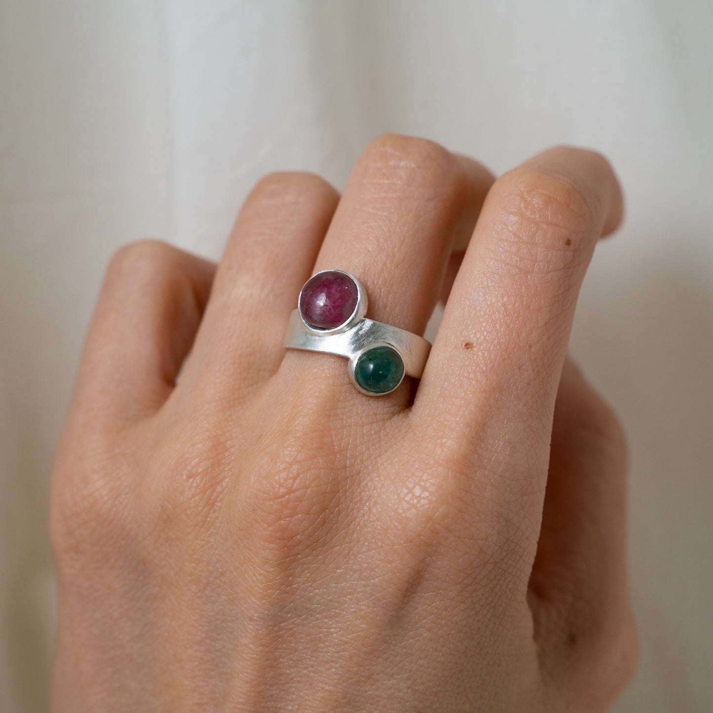 Pink tourmaline and emerald thick band silver ring