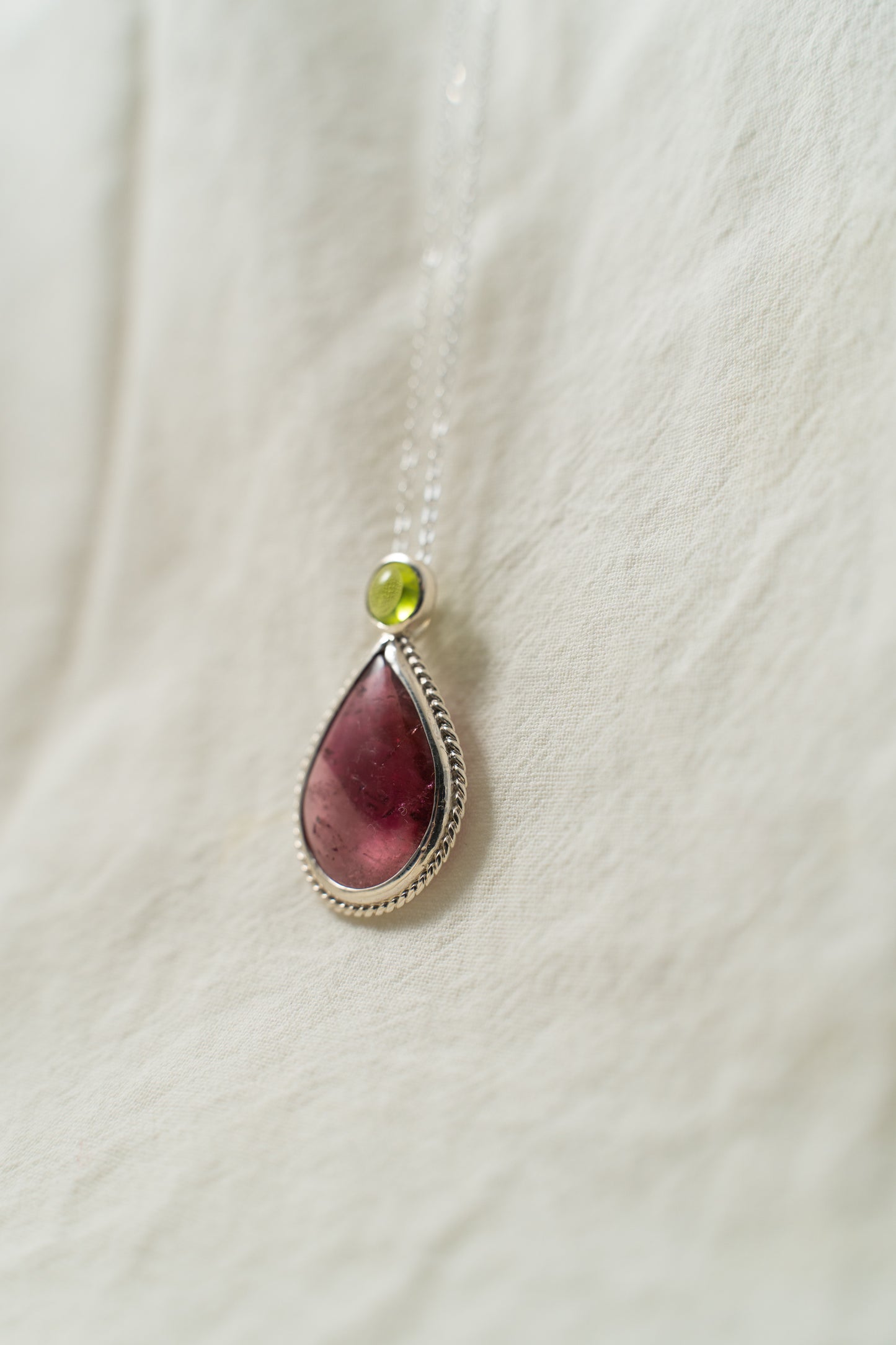 Bi-Color pink tourmaline and green peridot silver pendant