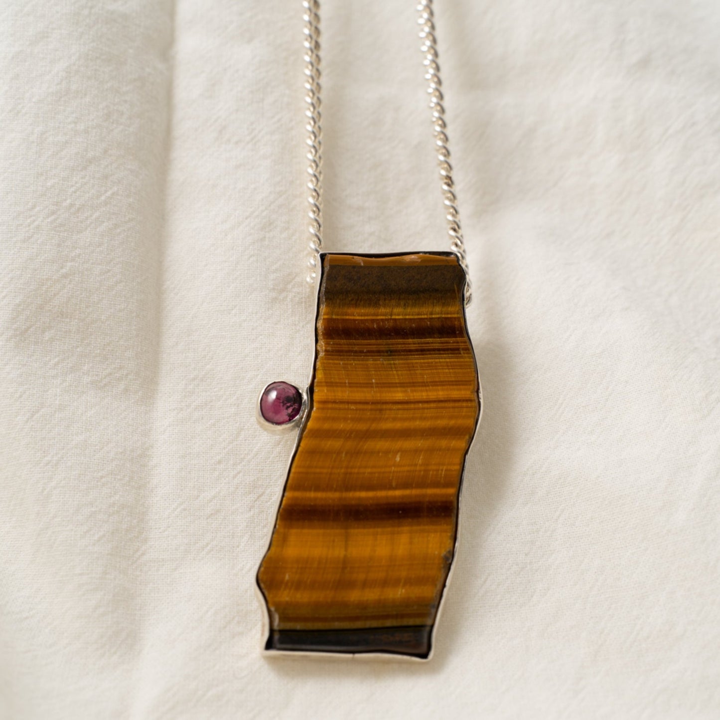 Large tiger’s eye and pink tourmaline statement silver pendant