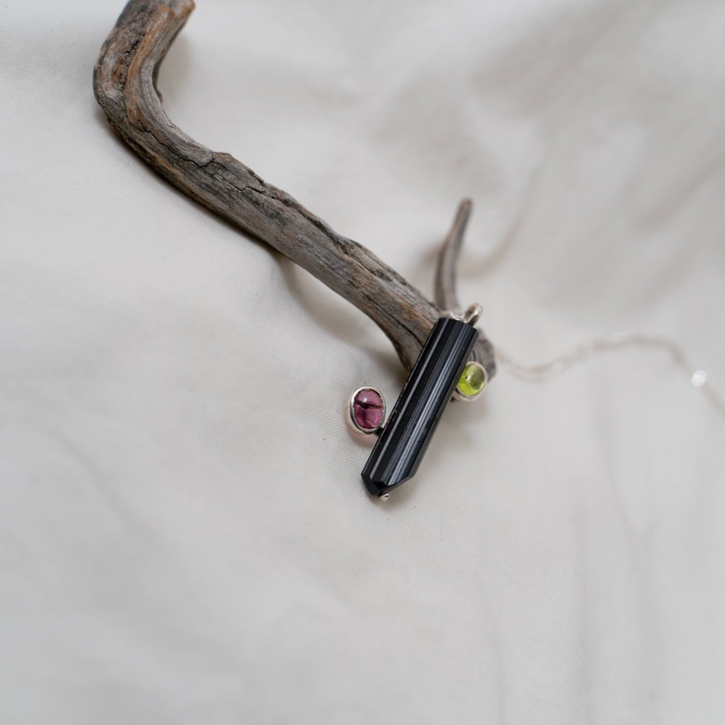 This is another perspective of the pendant showing you how it would look if you were glancing it from the side of the pink tourmaline.