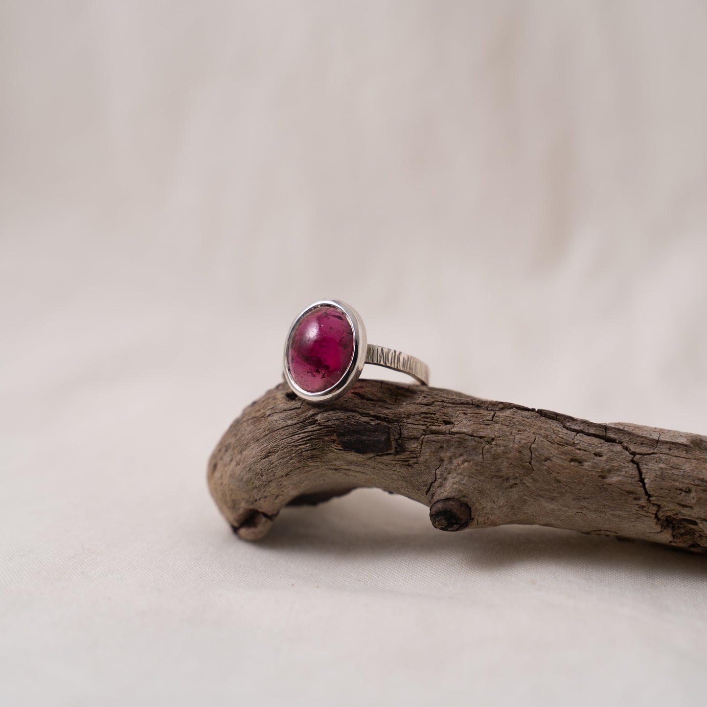 Handcrafted oval pink tourmaline cabochon silver textured ring