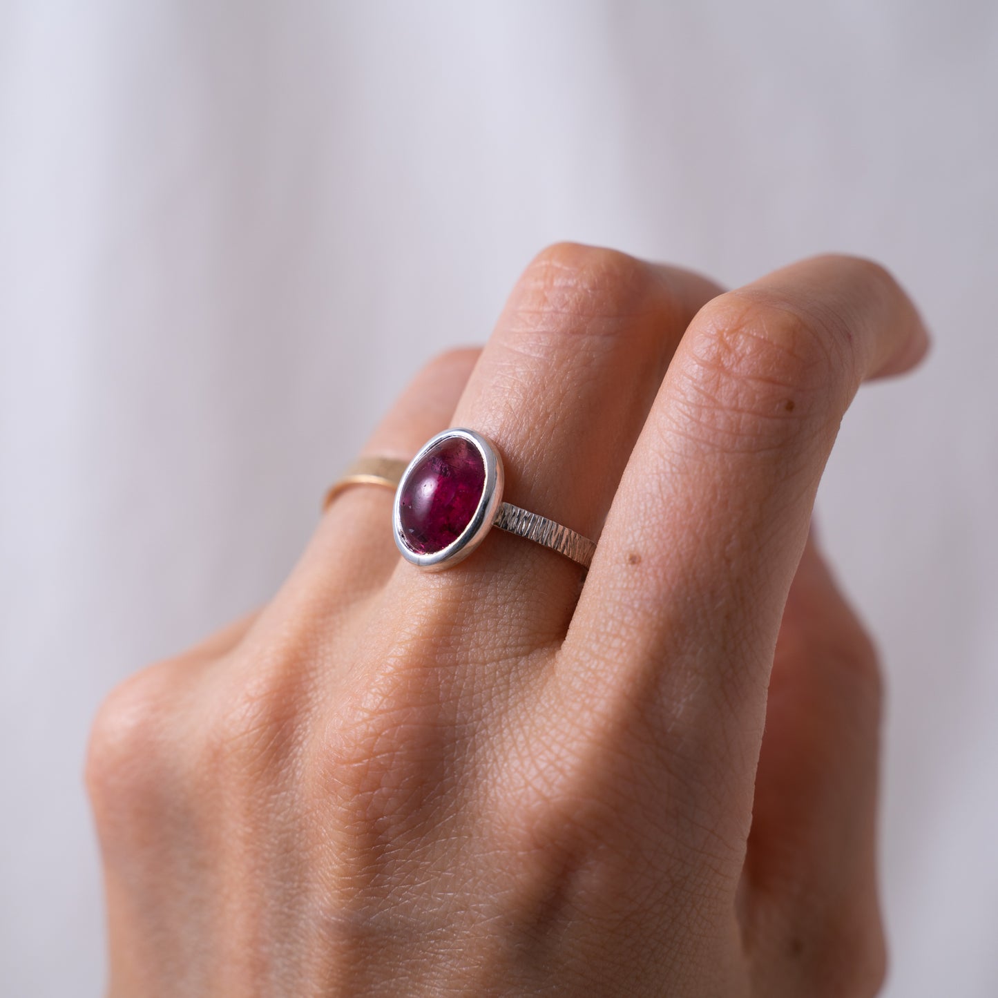 Handcrafted oval pink tourmaline cabochon silver textured ring
