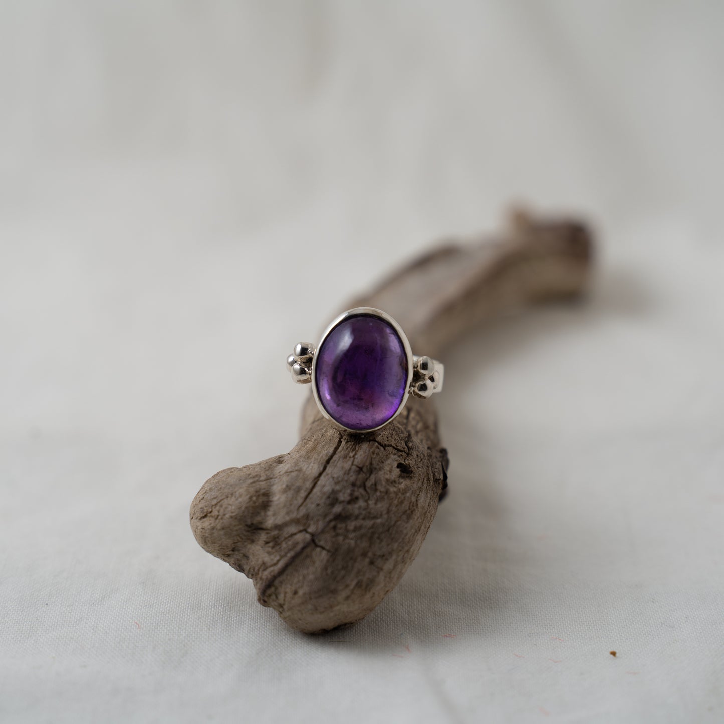 Amethyst and silver granule ring
