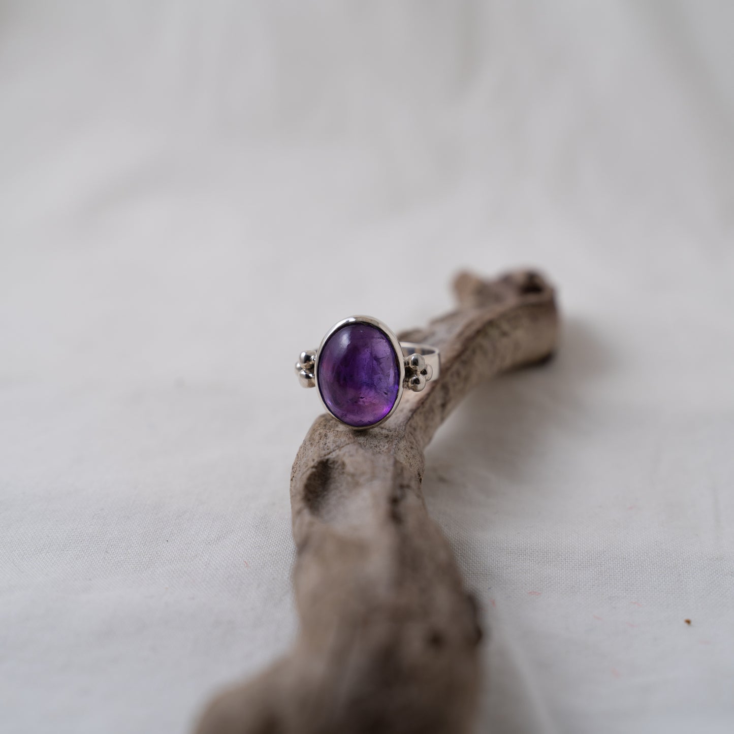 Amethyst and silver granule ring