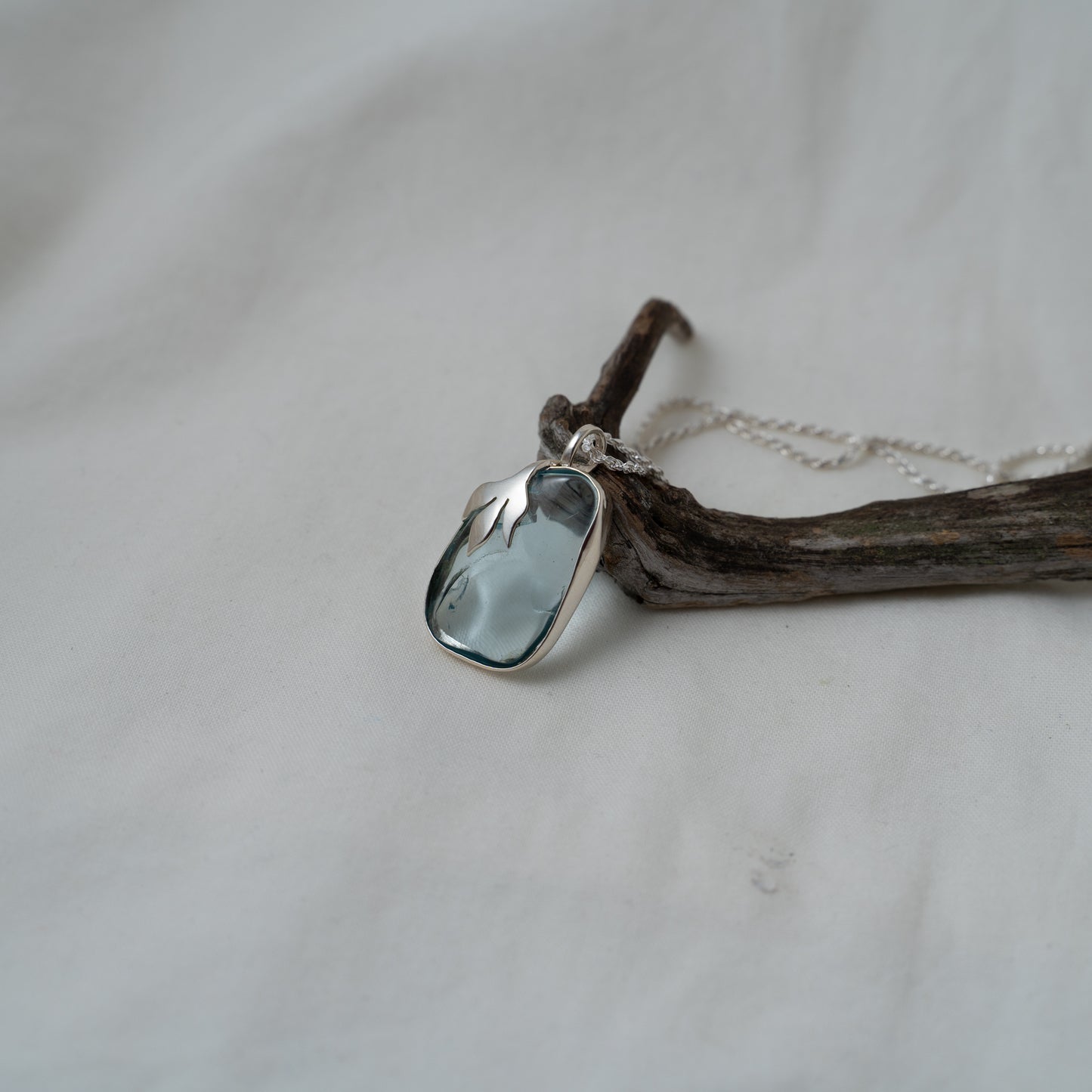 Aquamarine, floral leaf silver pendant