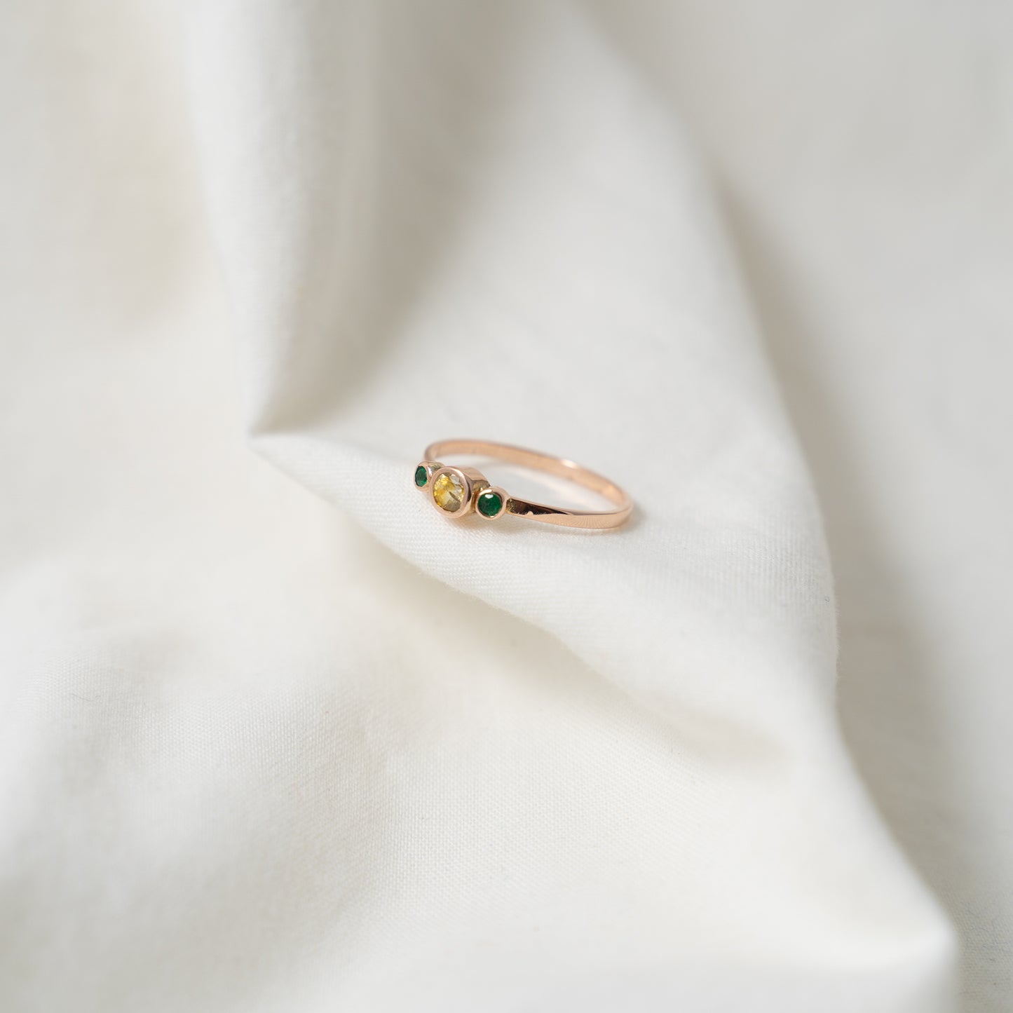 Taiga | Yellow sapphire and emerald rose gold ring