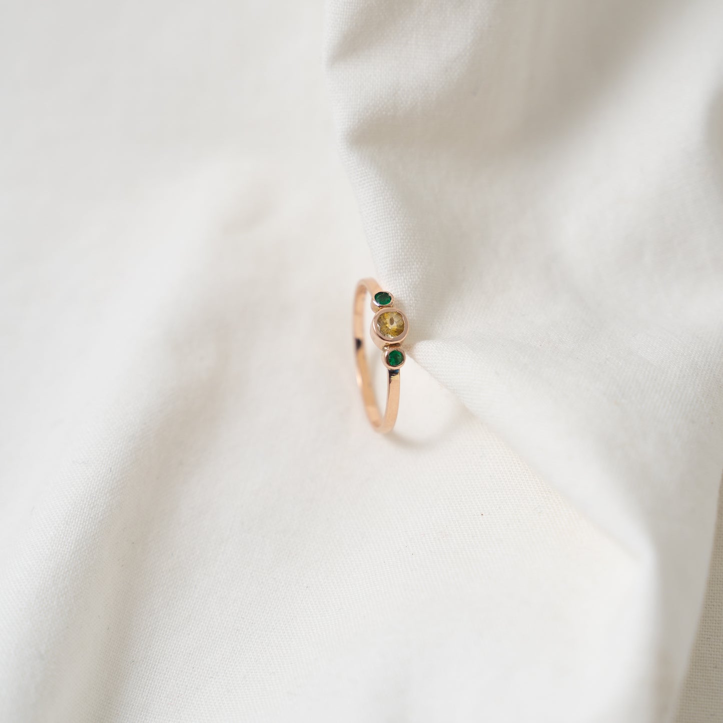 Taiga | Yellow sapphire and emerald rose gold ring