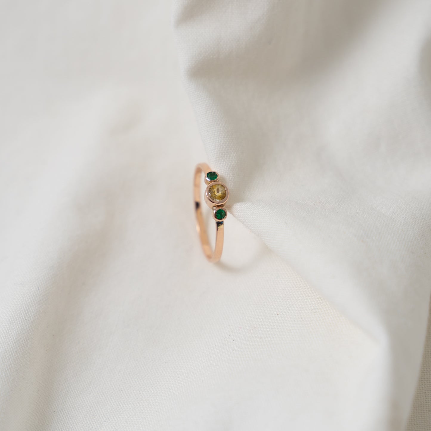 Taiga | Yellow sapphire and emerald rose gold ring