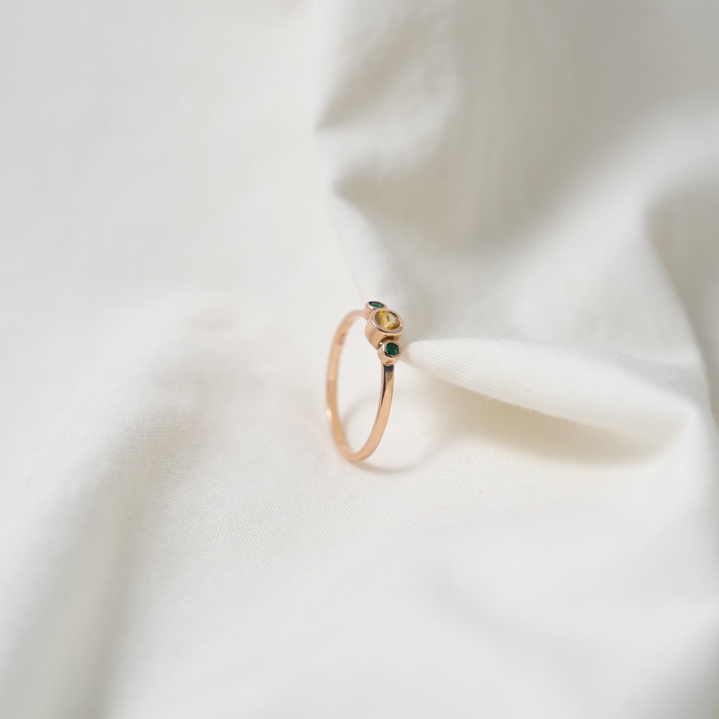 Taiga | Yellow sapphire and emerald rose gold ring