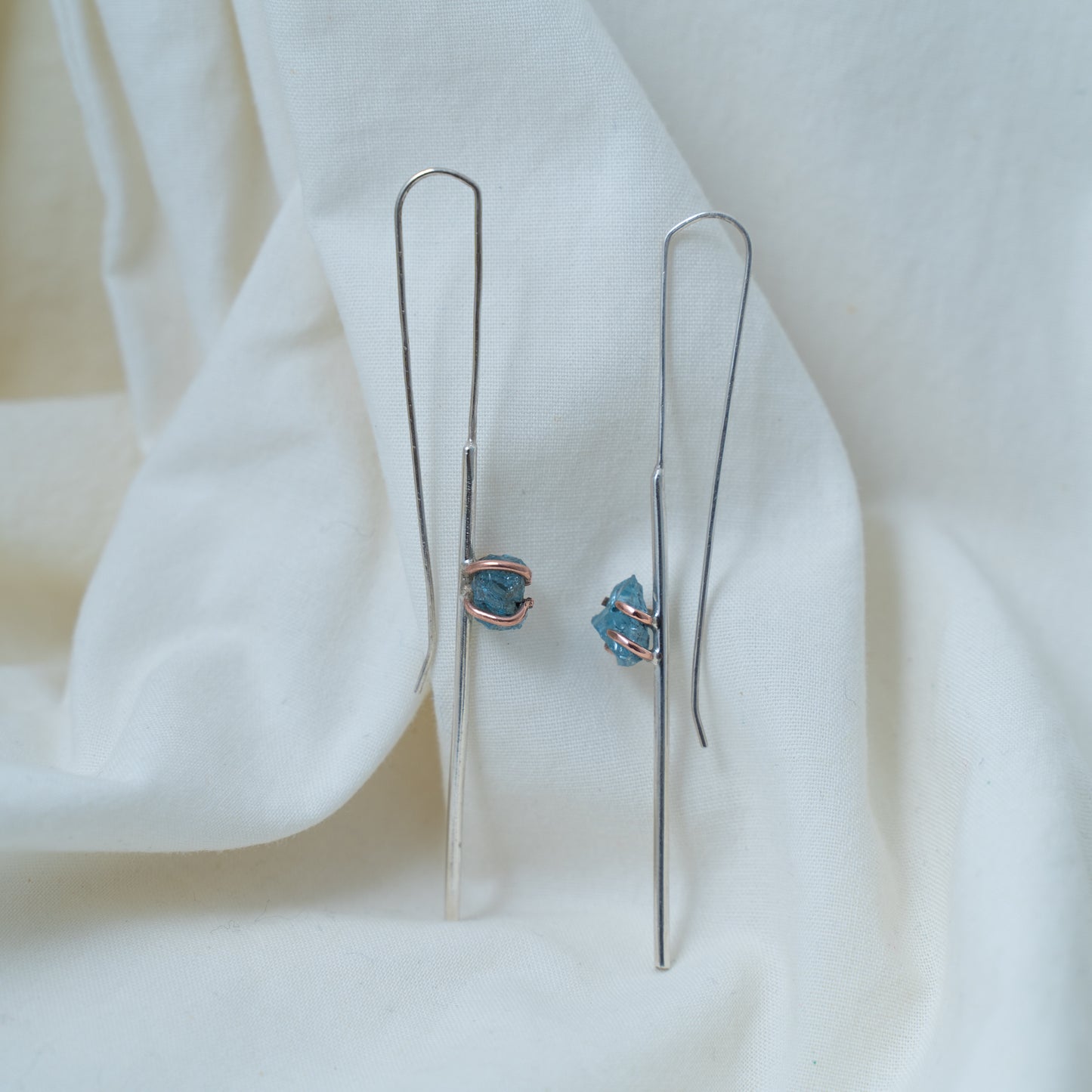 Silver and Copper statement line earrings set with raw aquamarines