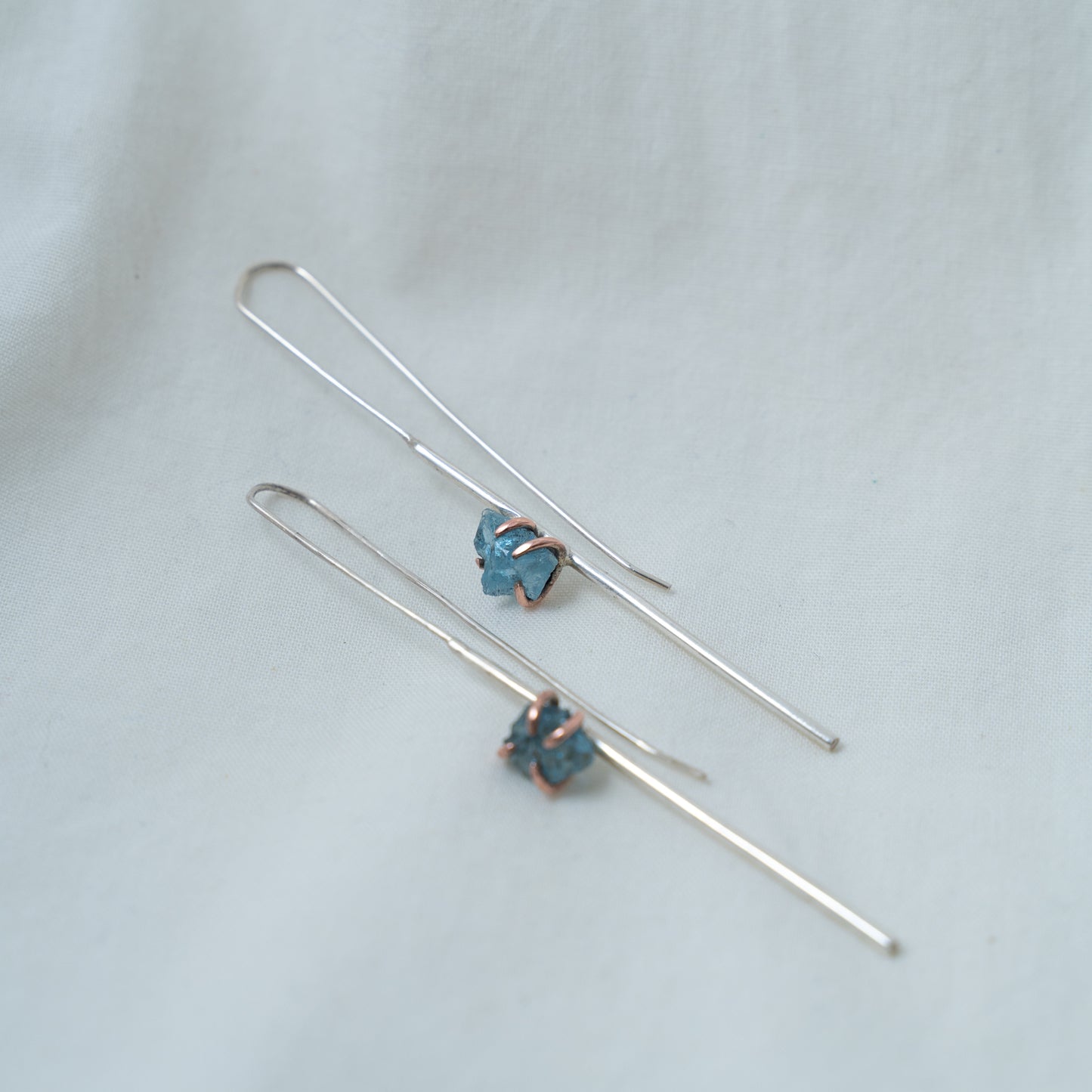 Silver and Copper statement line earrings set with raw aquamarines