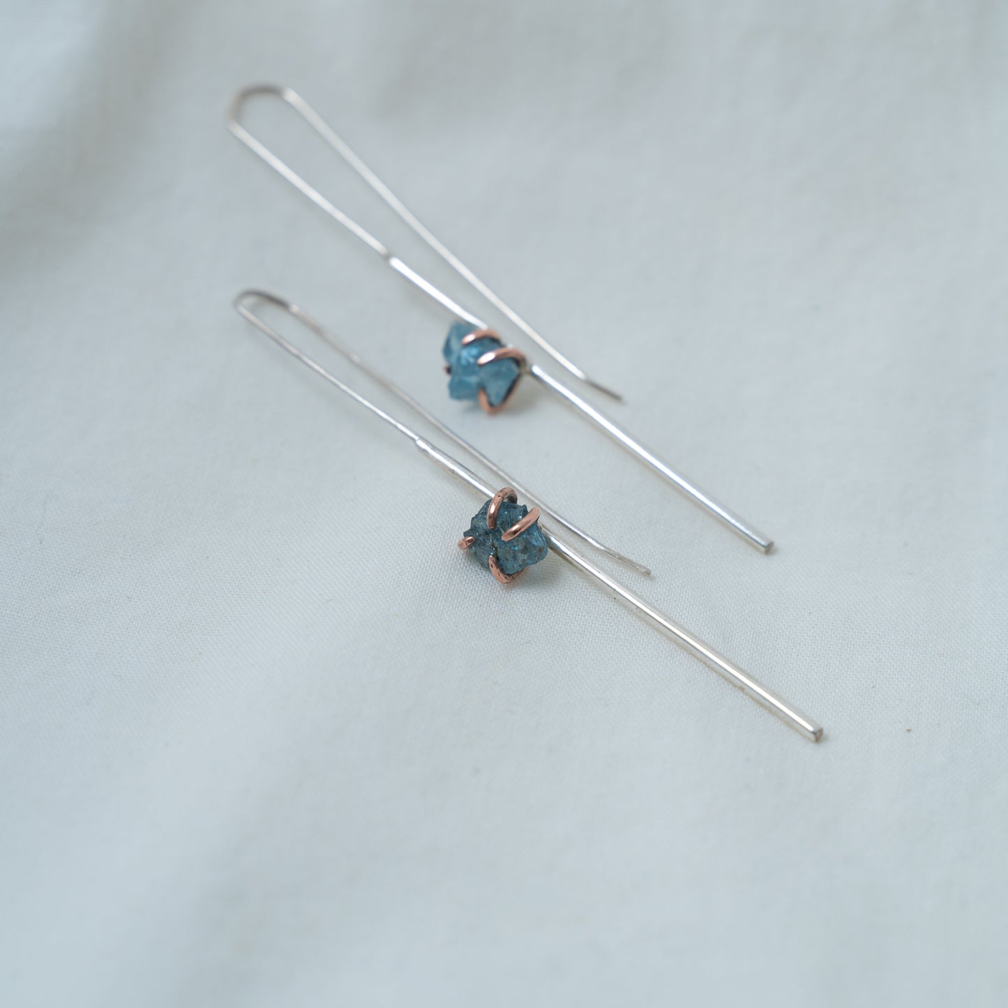 Silver and Copper statement line earrings set with raw aquamarines