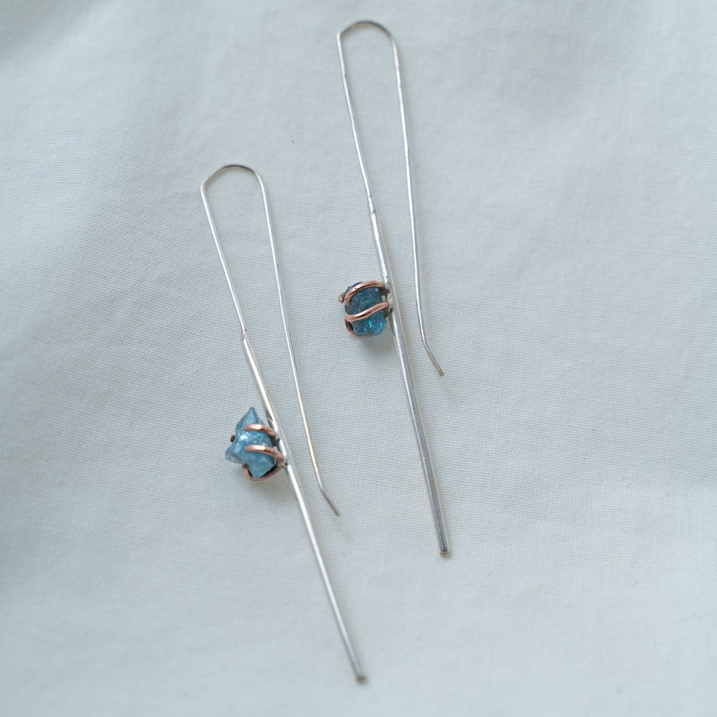 Silver and Copper statement line earrings set with raw aquamarines