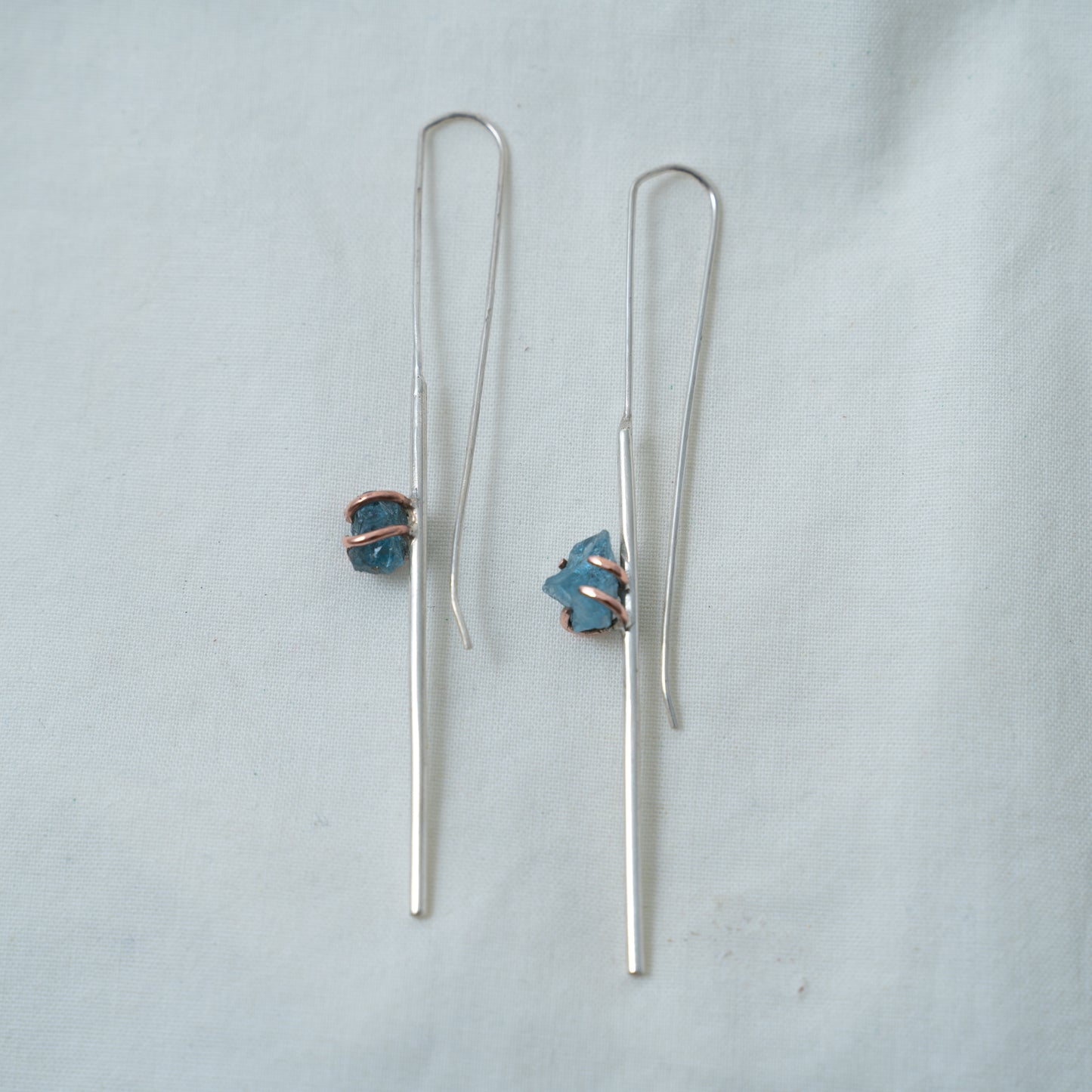 Silver and Copper statement line earrings set with raw aquamarines