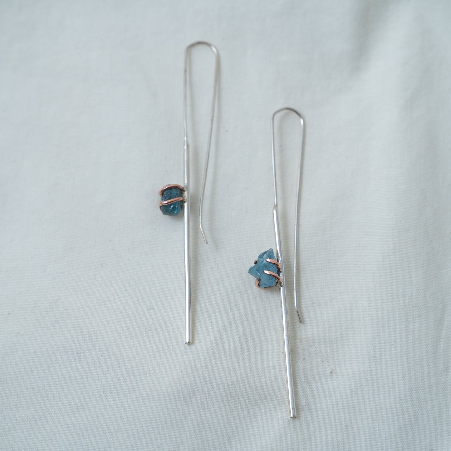 Silver and Copper statement line earrings set with raw aquamarines