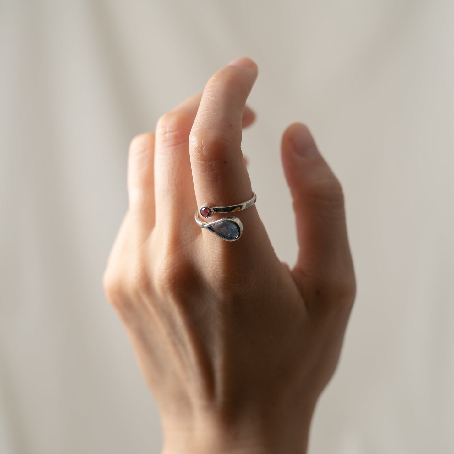 Aquamarine and rhodalite open silver ring