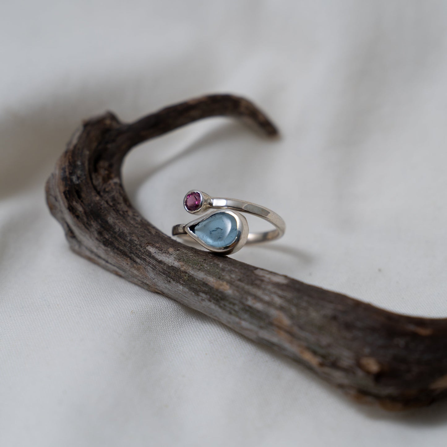 Aquamarine and rhodalite open silver ring