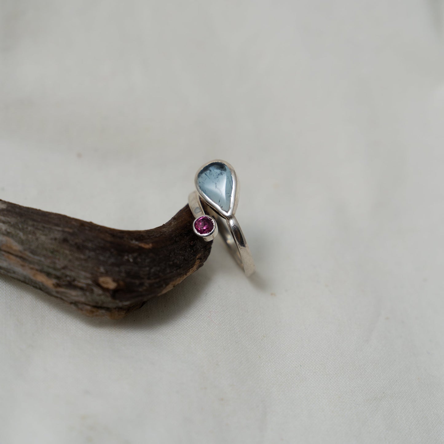 Aquamarine and rhodalite open silver ring