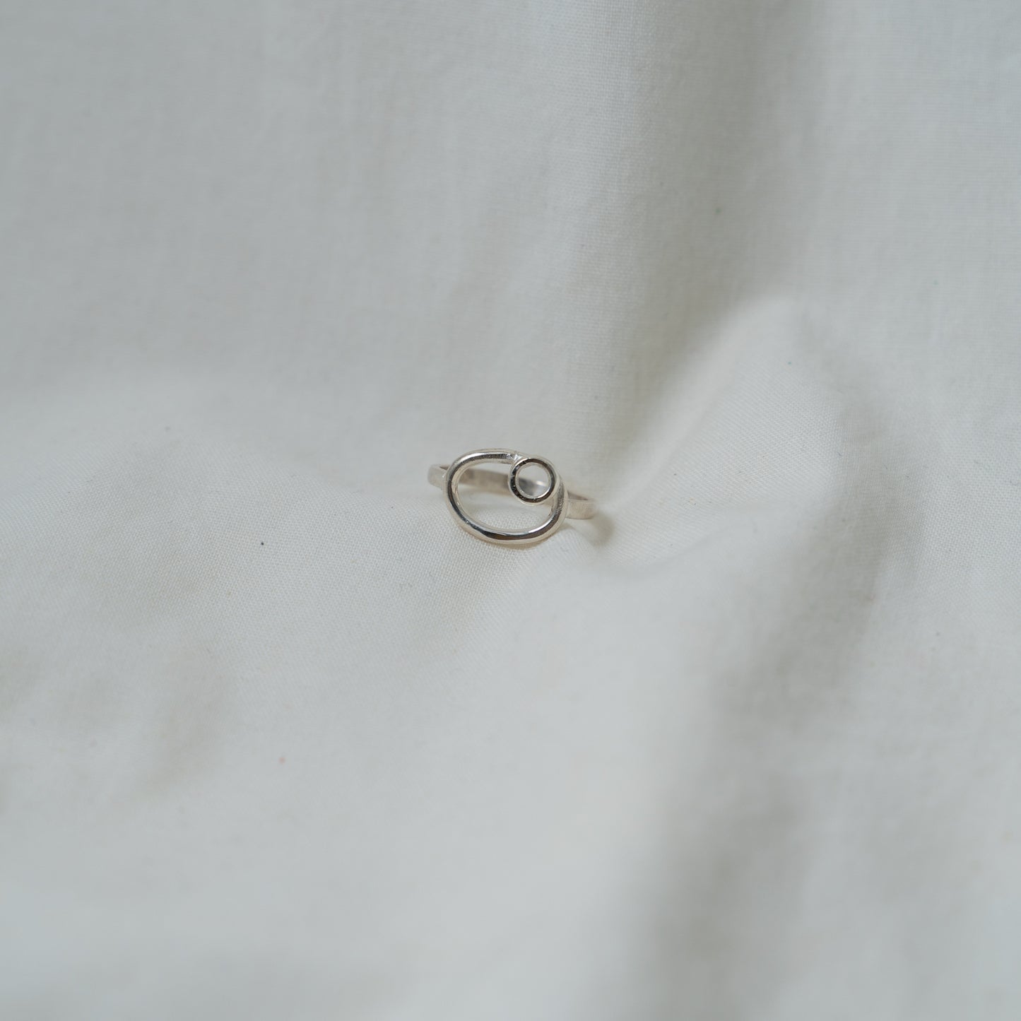 Dual oval and circle, small silver ring