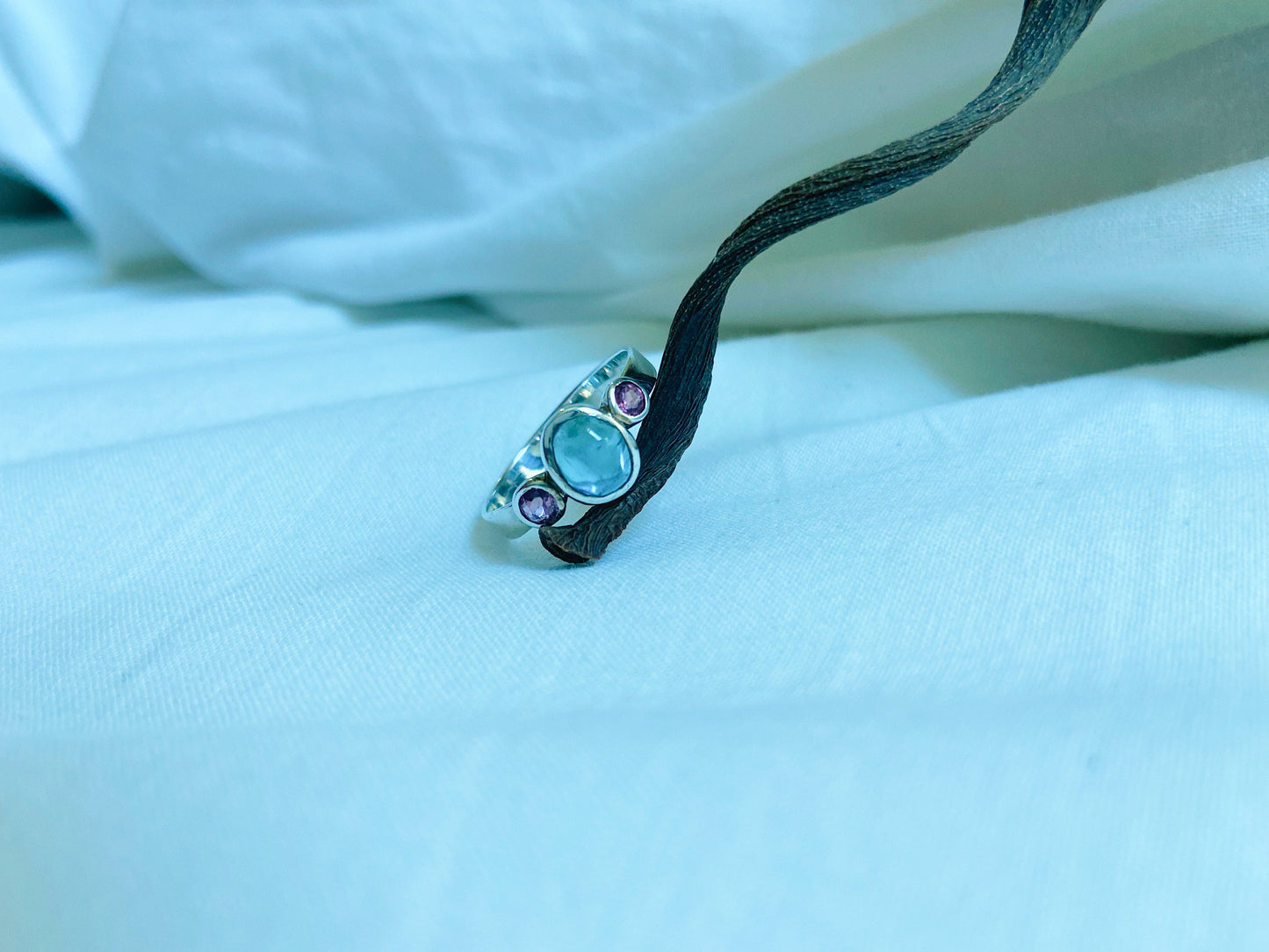 Anthia | aquamarine and garnet silver ring