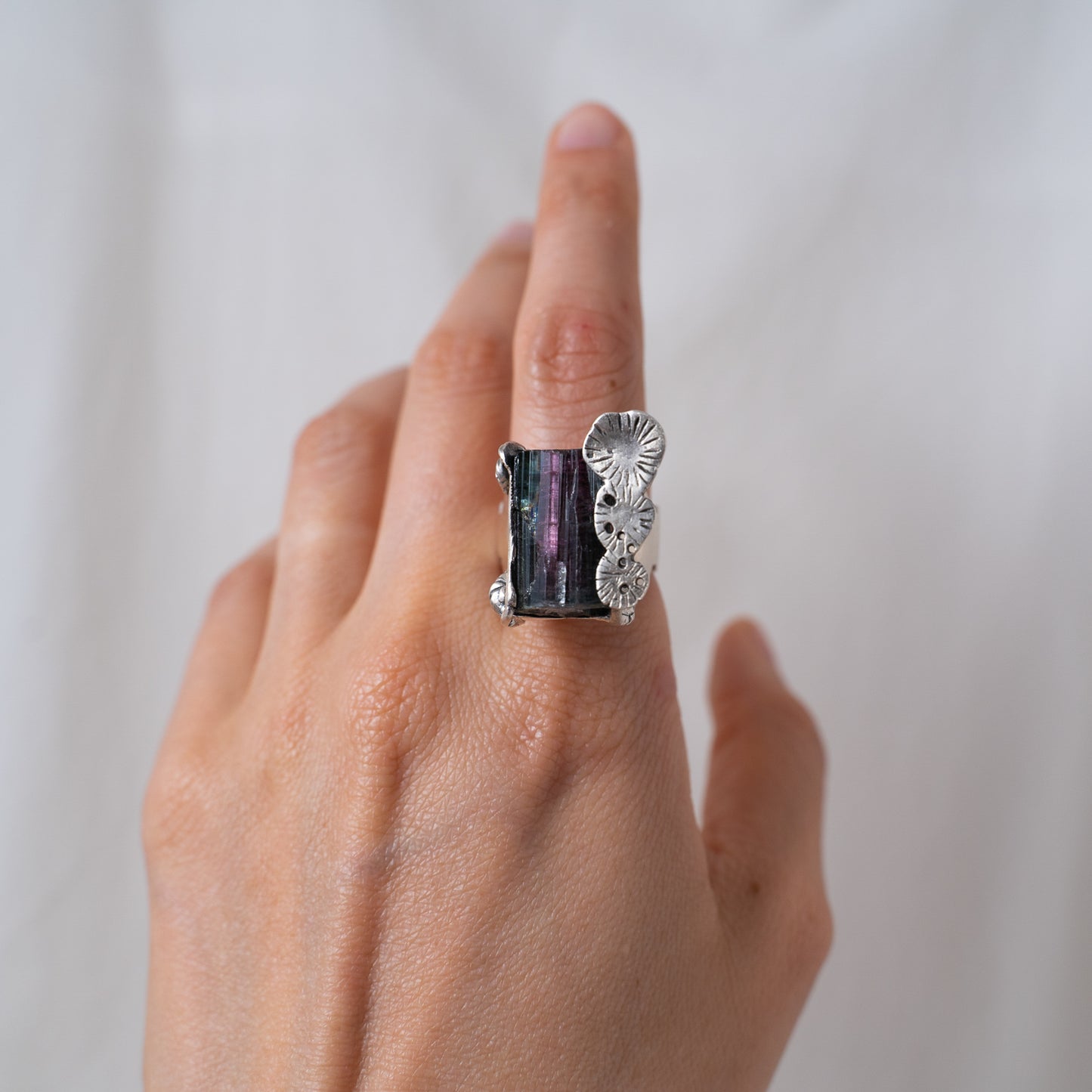 The Savannah Ring, oxidized sterling silver hand sculpted and cast from wax with a hand set raw watermelon tourmaline crystal in this iconic statement ring