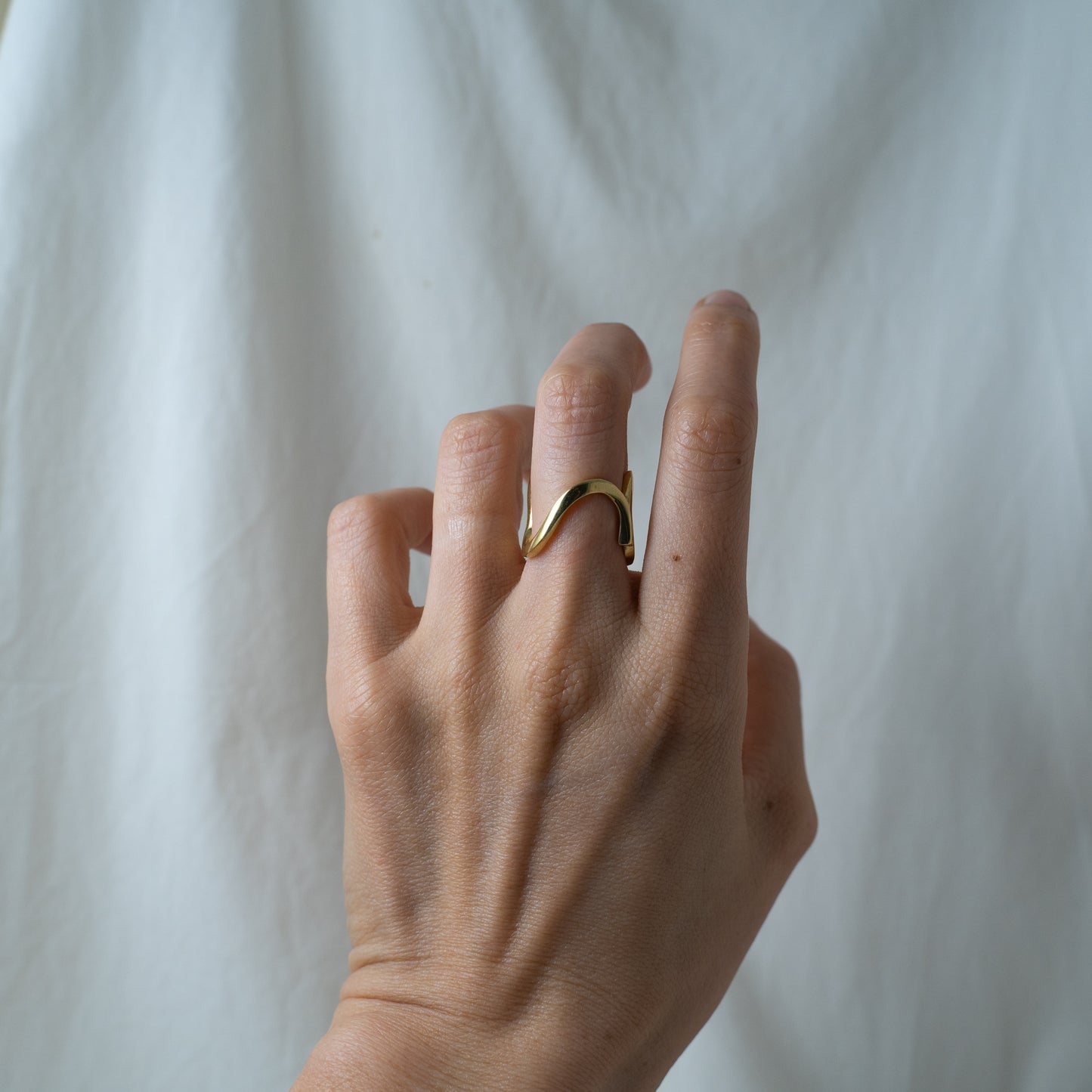 Gold curve movement ring (multifunctional)