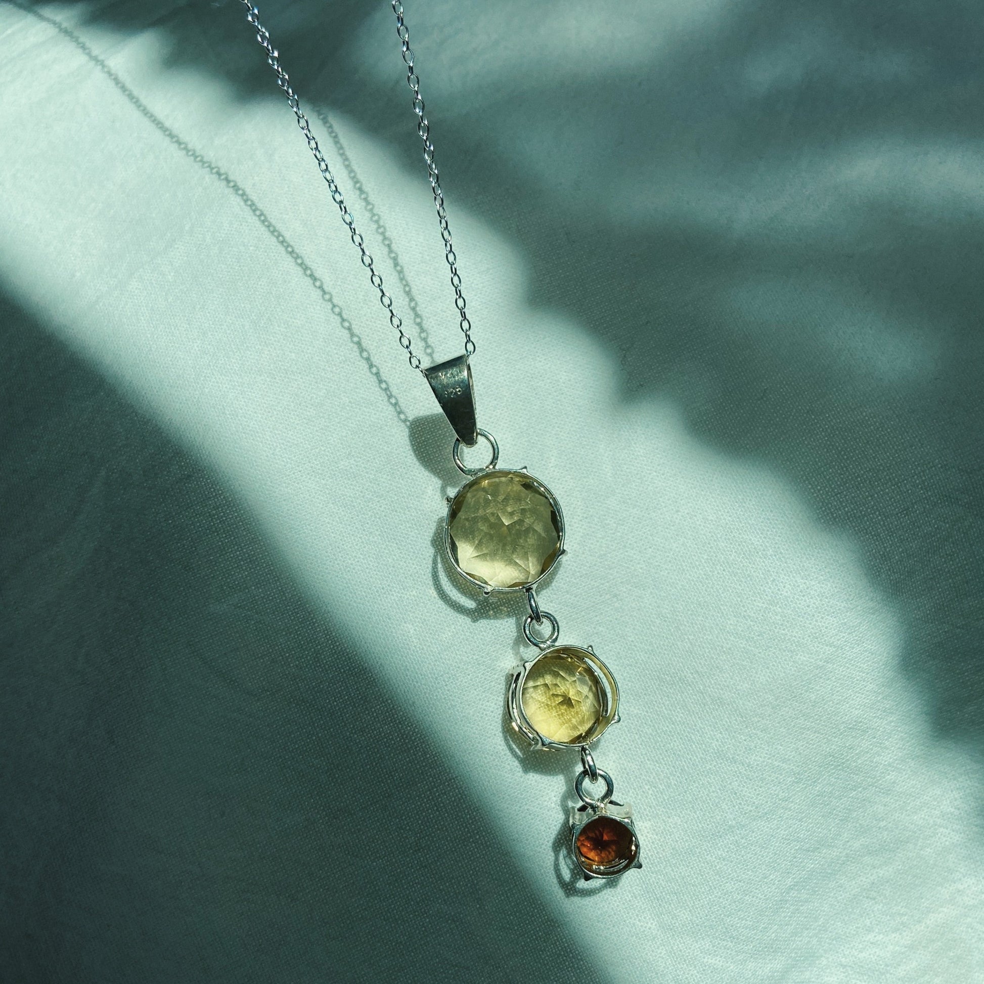 Handcrafted citrine and tourmaline silver pendant