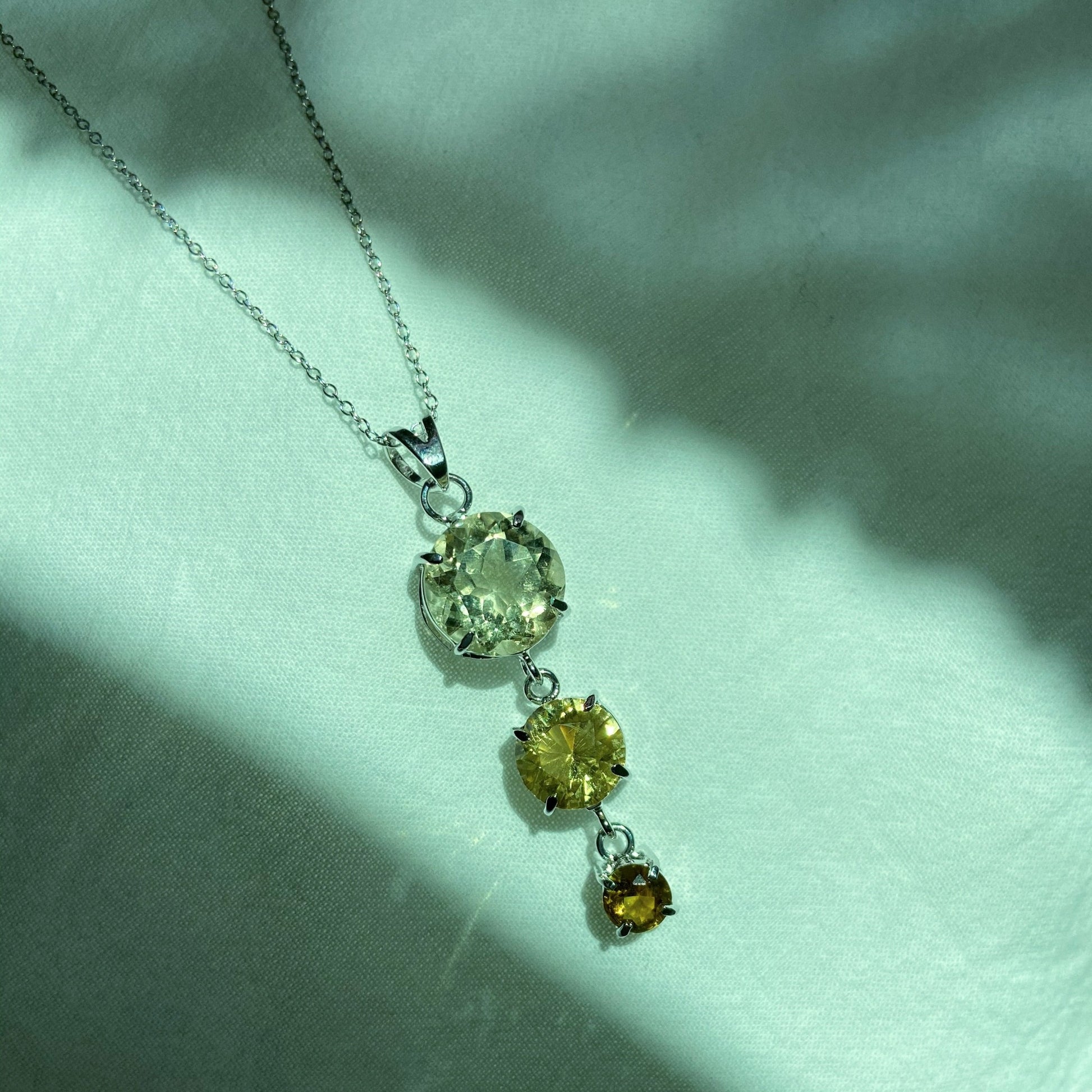 Handcrafted citrine and scapolite silver pendant