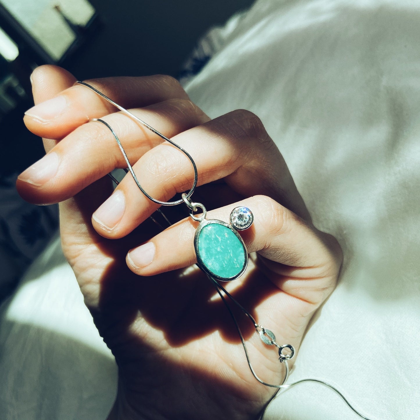 Turquoise and cubic Zirconia silver pendant