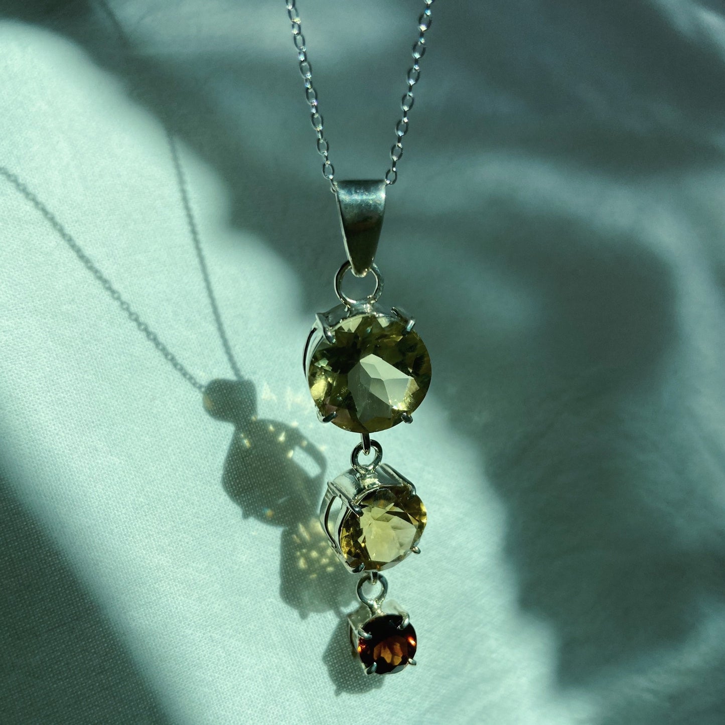 Handcrafted citrine and tourmaline silver pendant