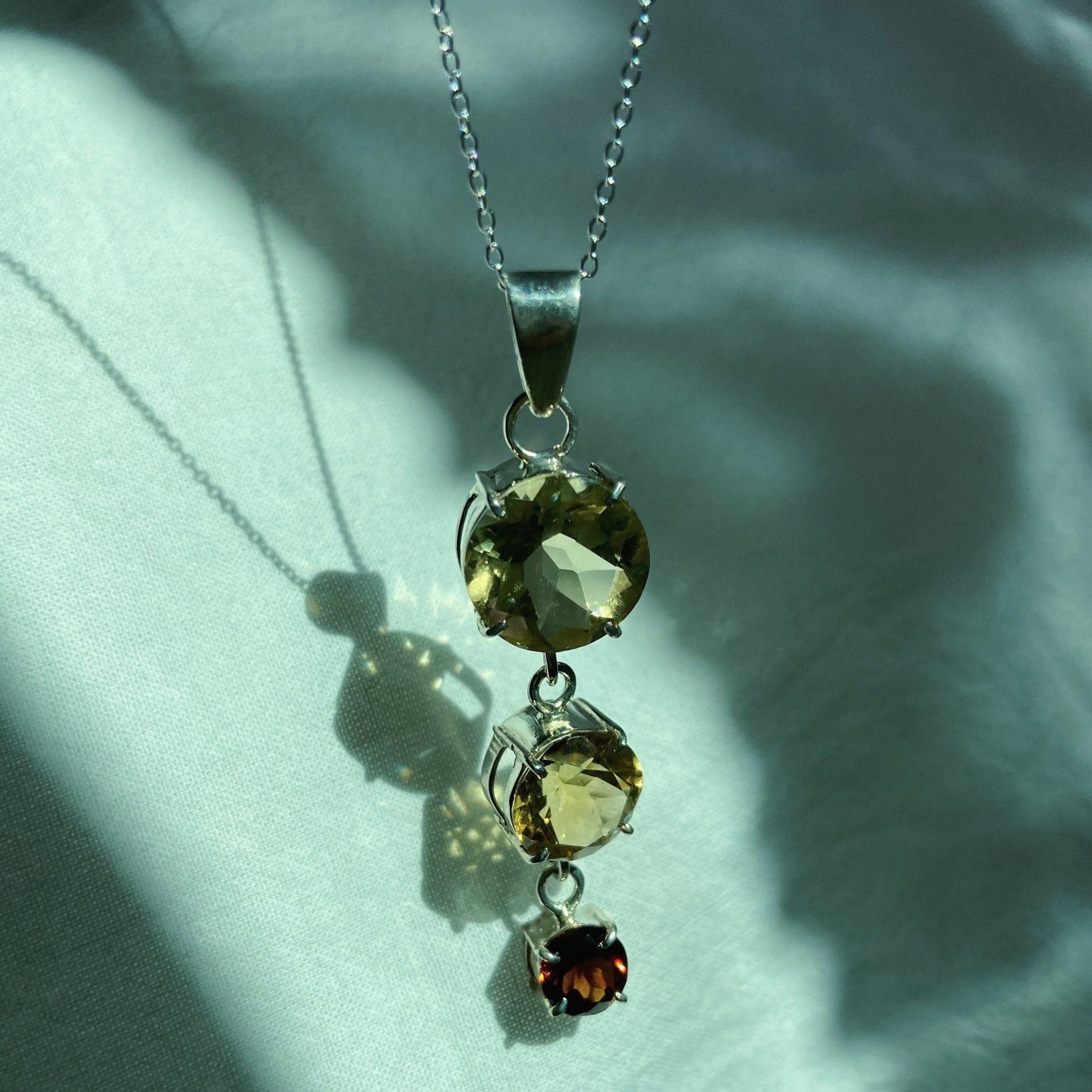 Handcrafted citrine and tourmaline silver pendant