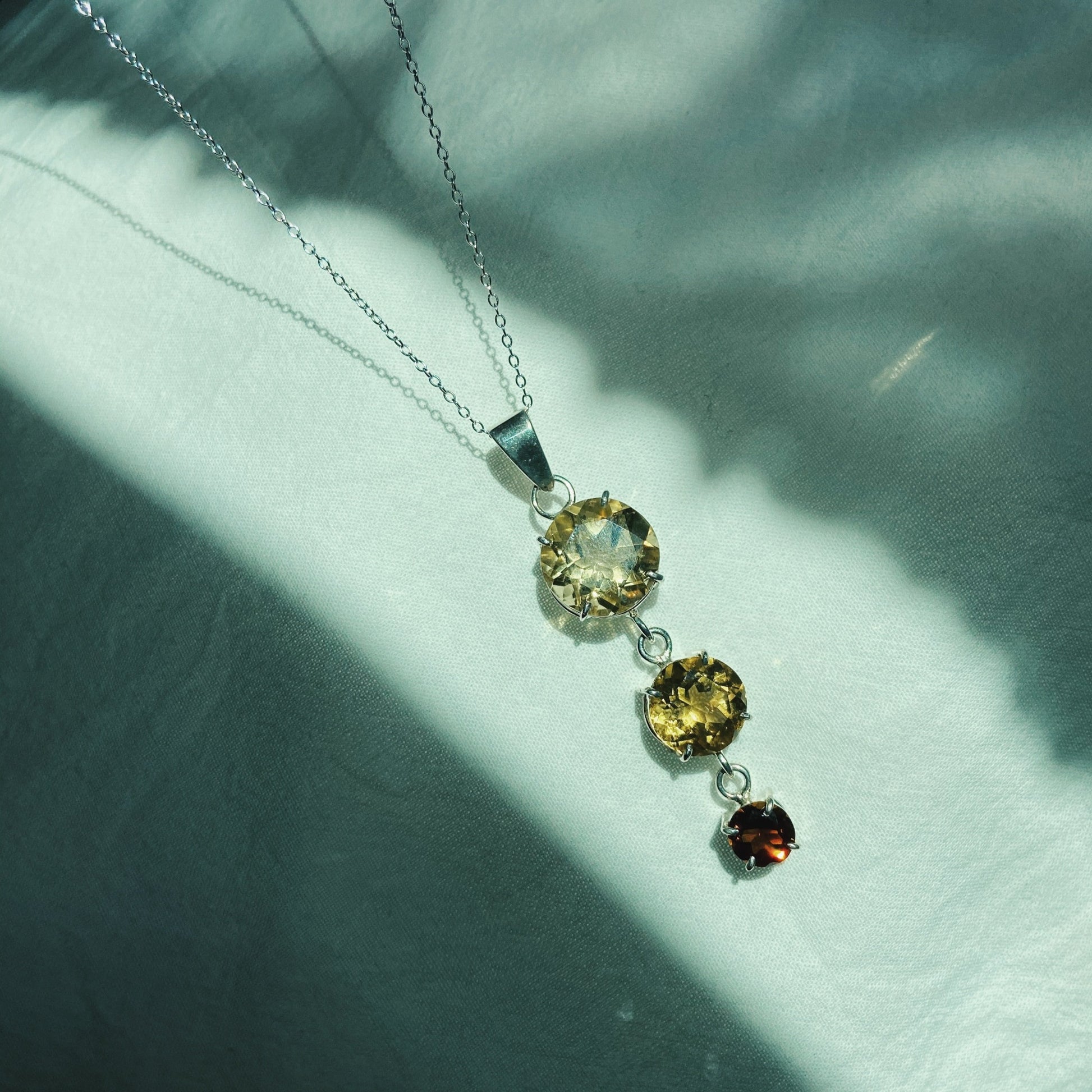 Handcrafted citrine and tourmaline silver pendant