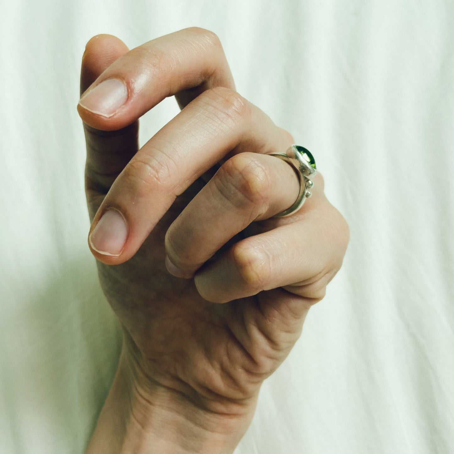 Exquisite Tanzanian peridot handcrafted in a timeless silver ring