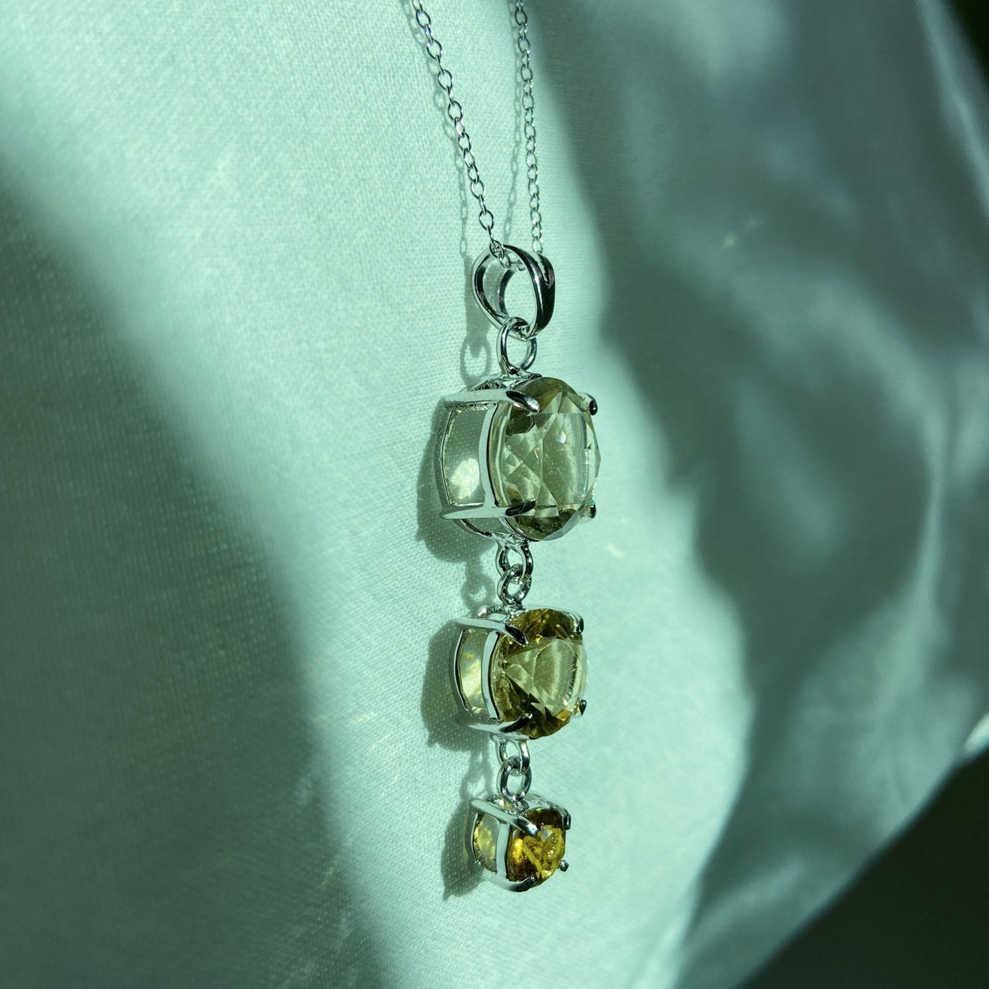 Handcrafted citrine and scapolite silver pendant