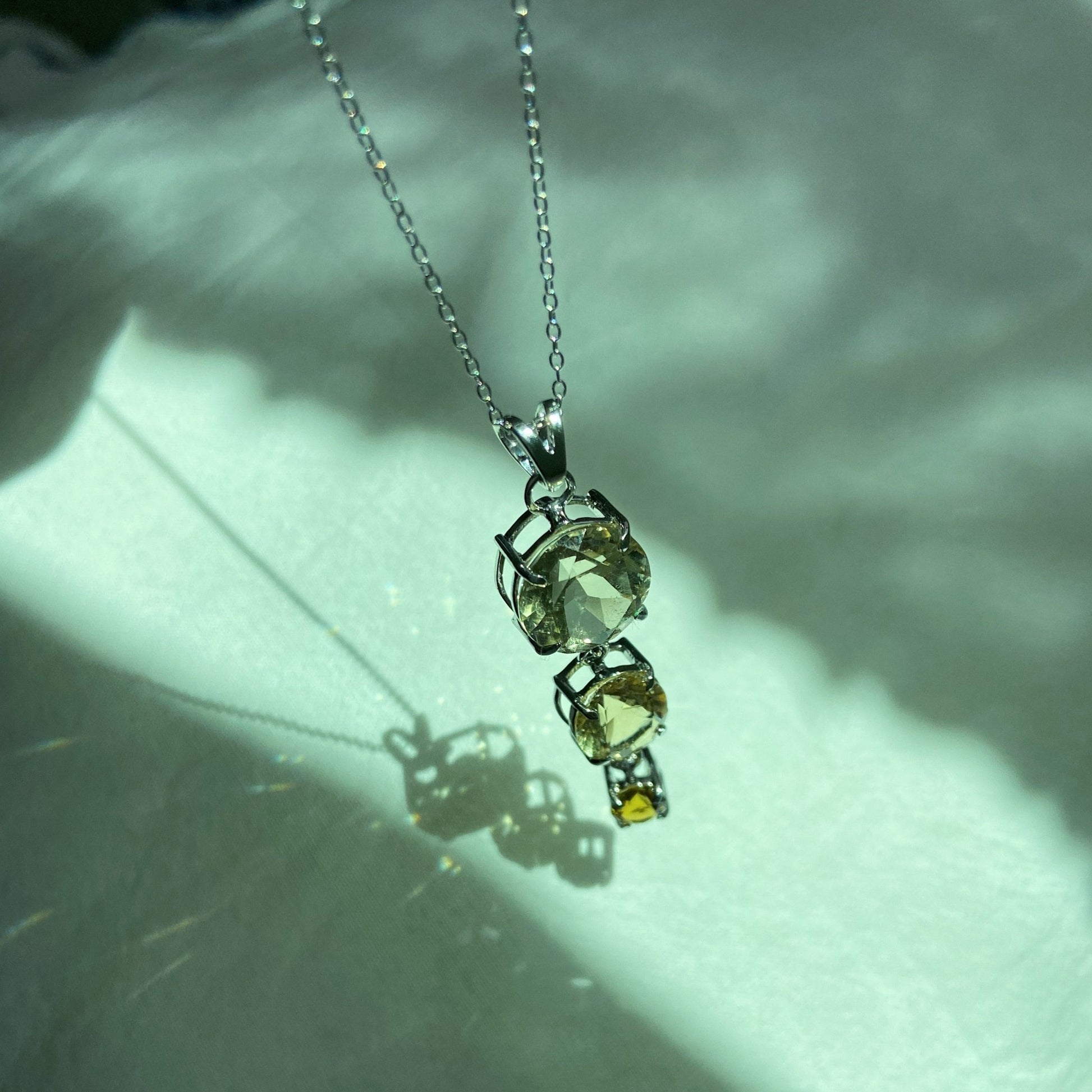 Handcrafted citrine and scapolite silver pendant